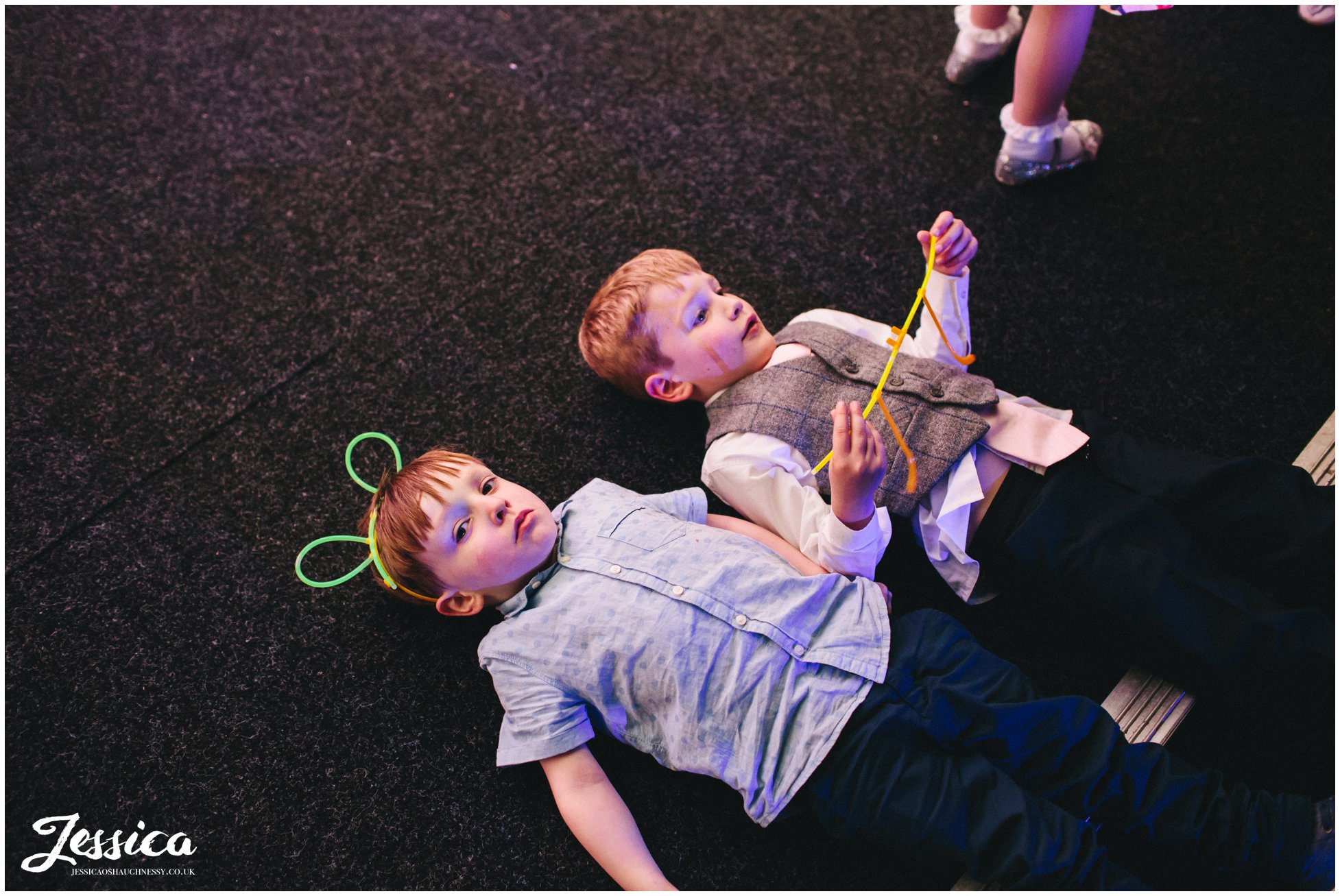 children wear glow stick ears at a wedding in cheshire