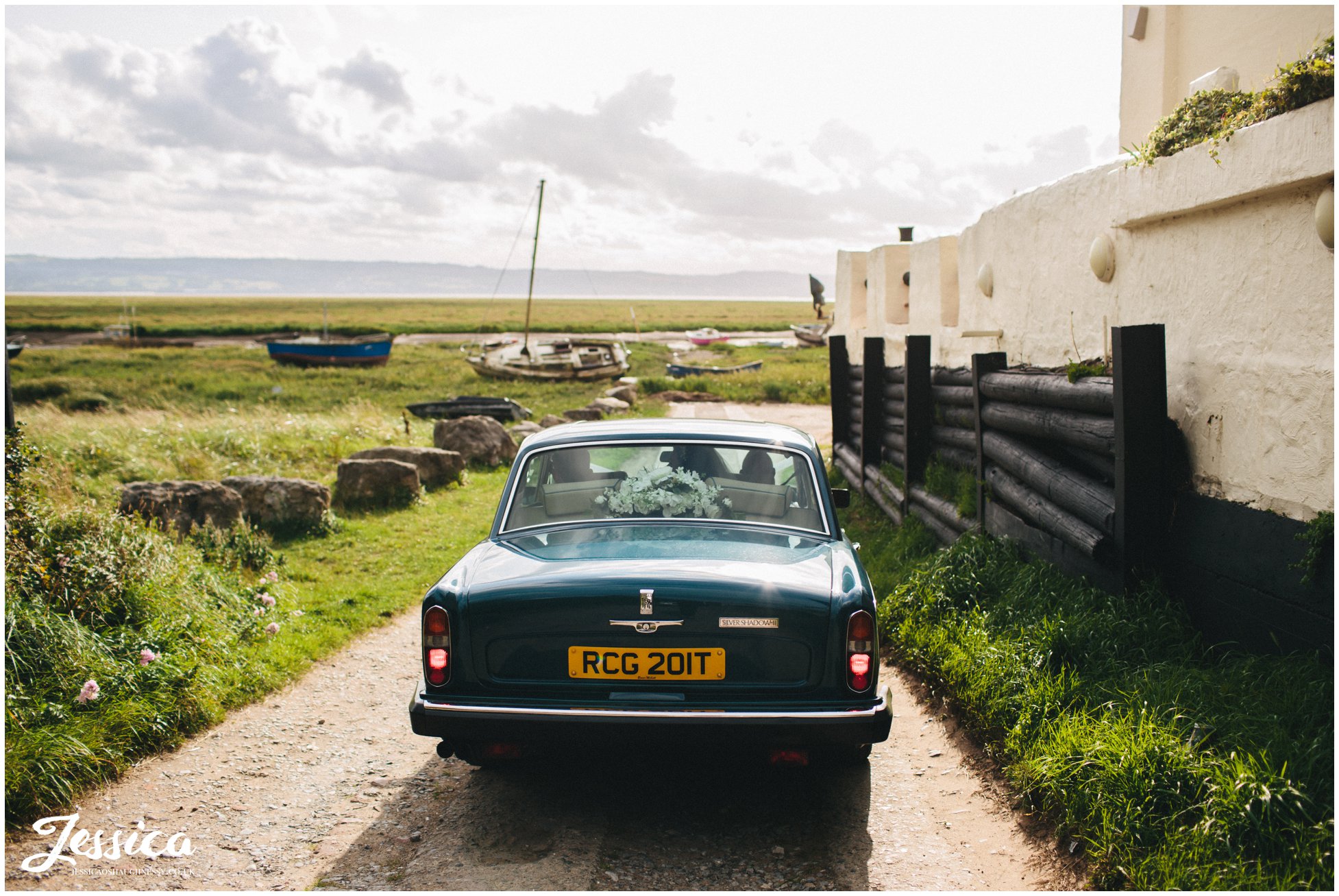 wedding car arrives at sheldrakes restaurant 