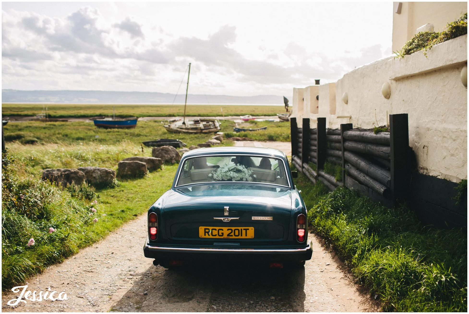 wedding car arrives at sheldrakes restaurant