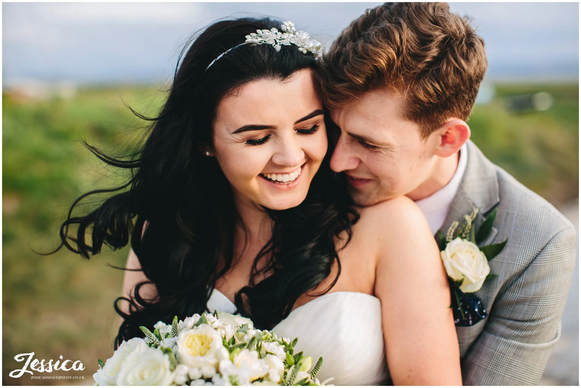 close up of bride and groom laughing