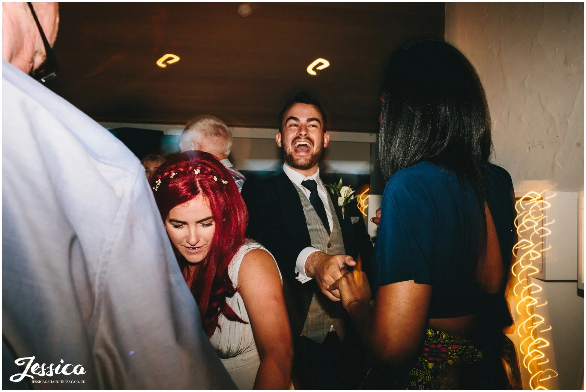 groomsmen points whilst dancing