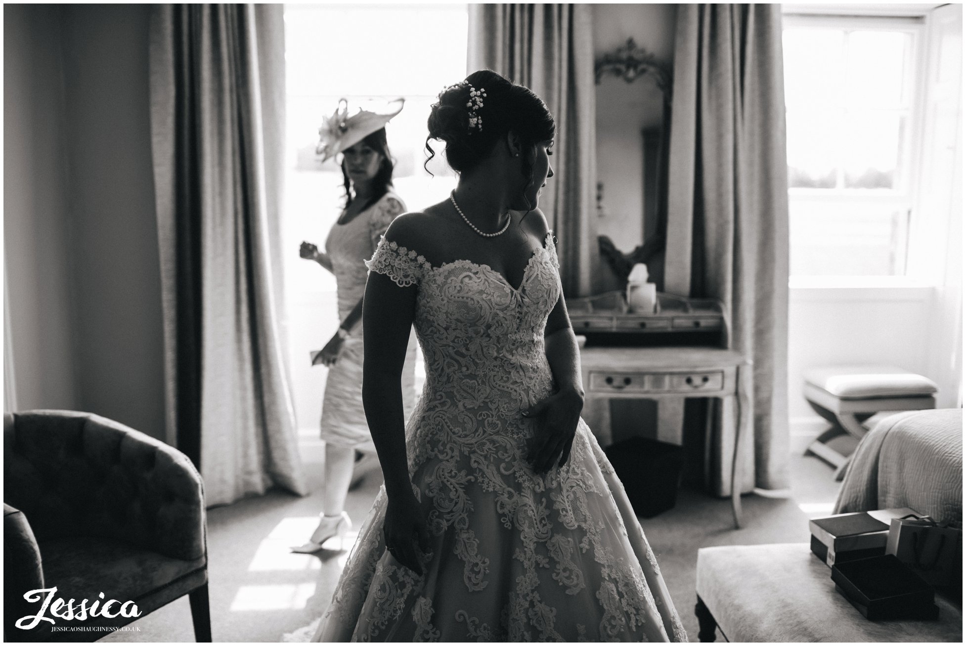 black and white photograph of the bride in her wedding dress