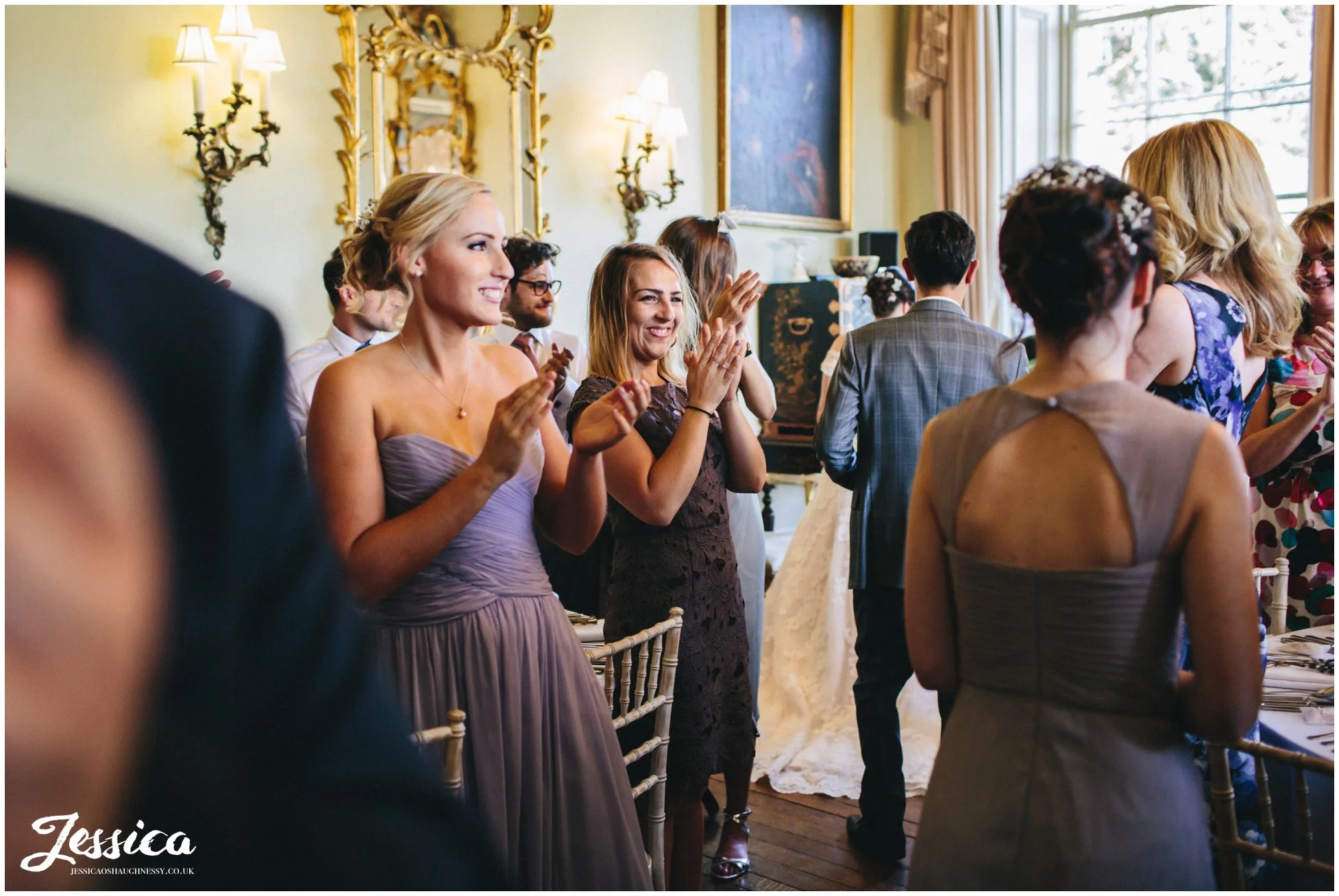 guests applaud newly wed's entrance