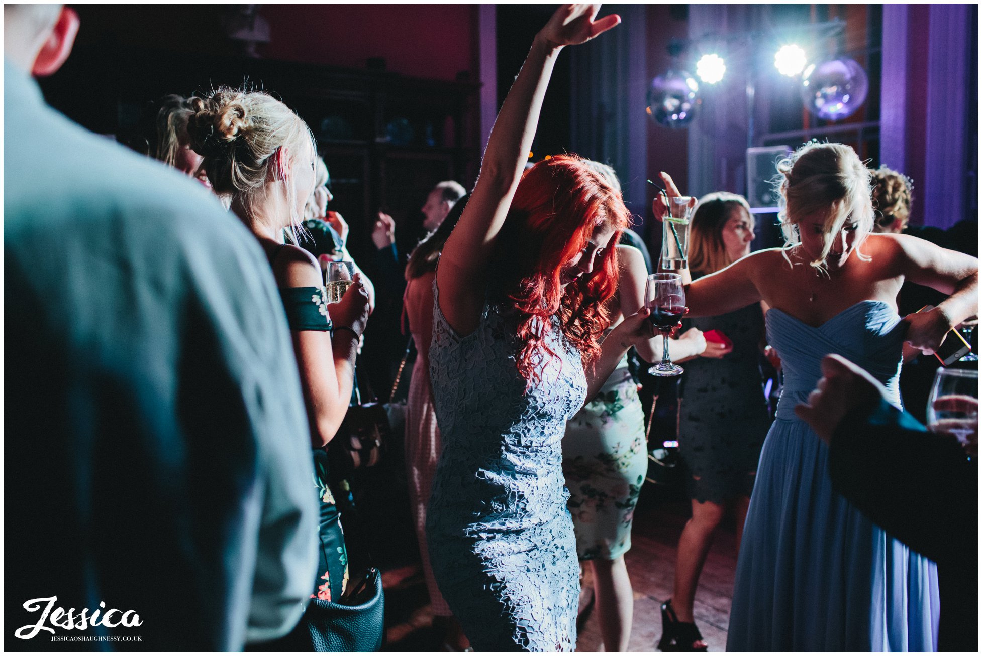 guests celebrating by dancing during the wedding reception - prestwold hall wedding