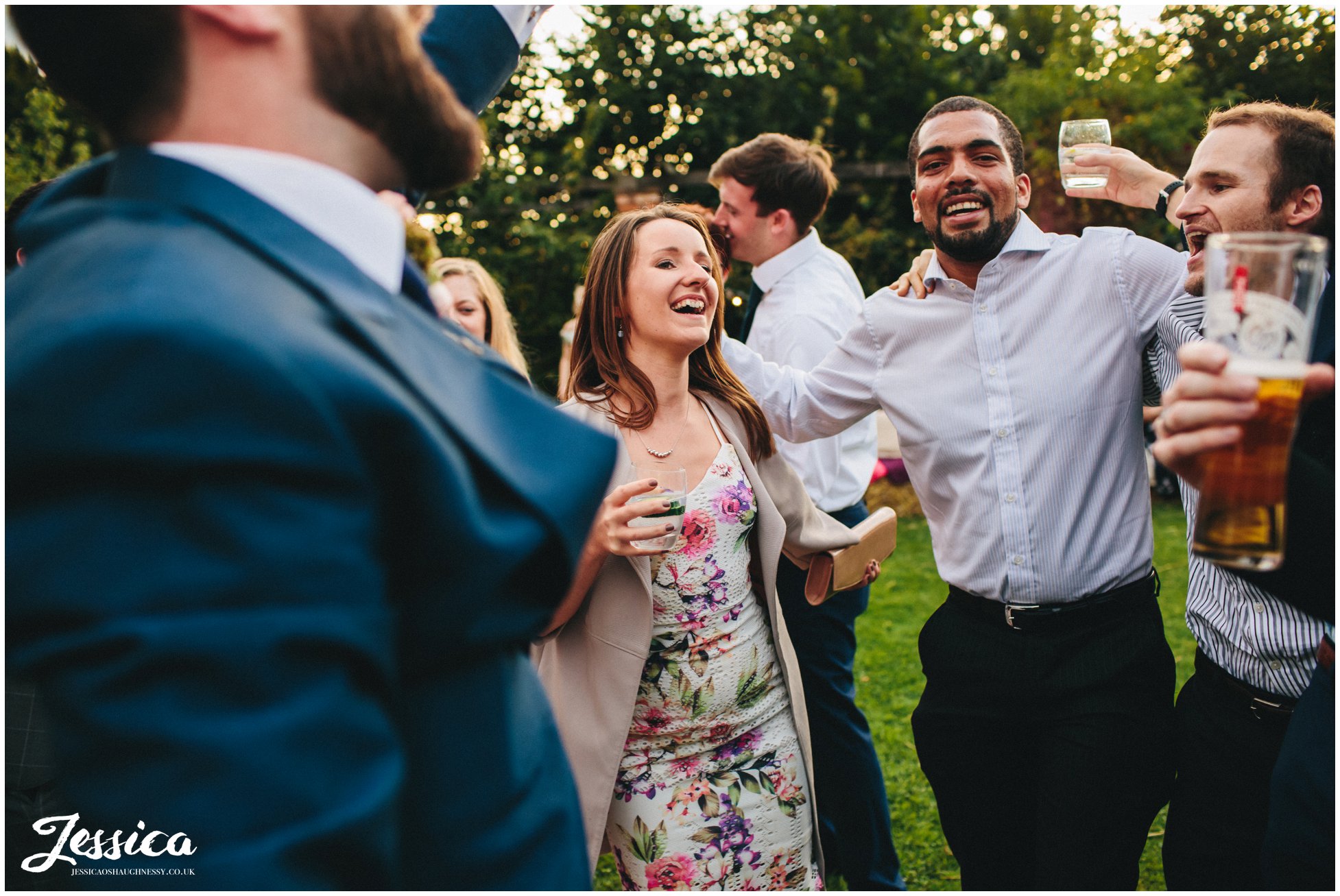 wedding guests join the first dance