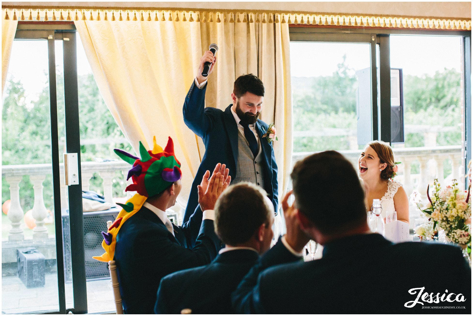 groom gives a speech on his wedding day at willington hall