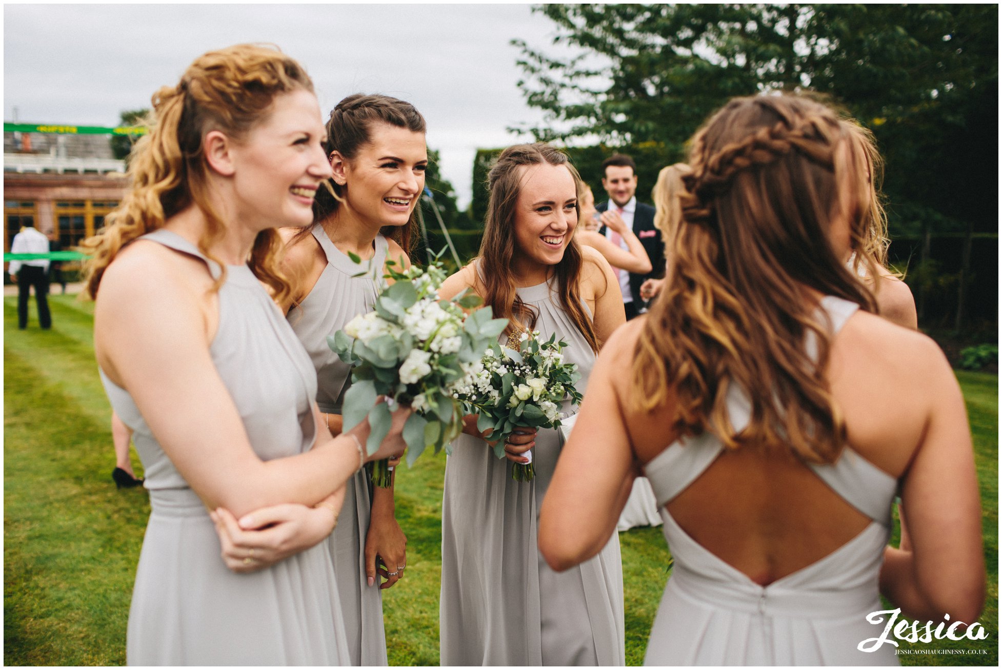 merrydale manor in cheshire - bridesmaids laughing together