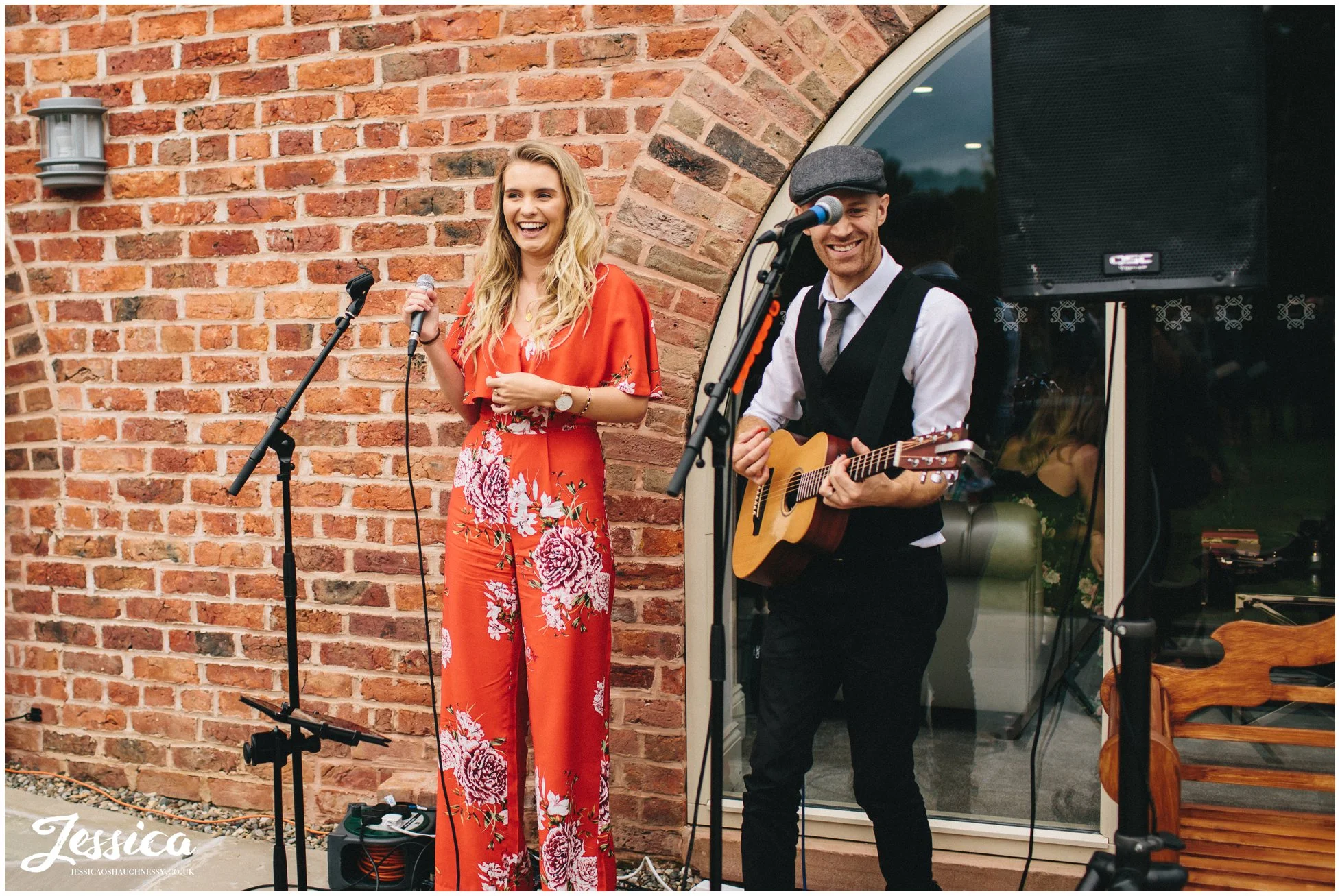 accoustic band set up outside and play to guests