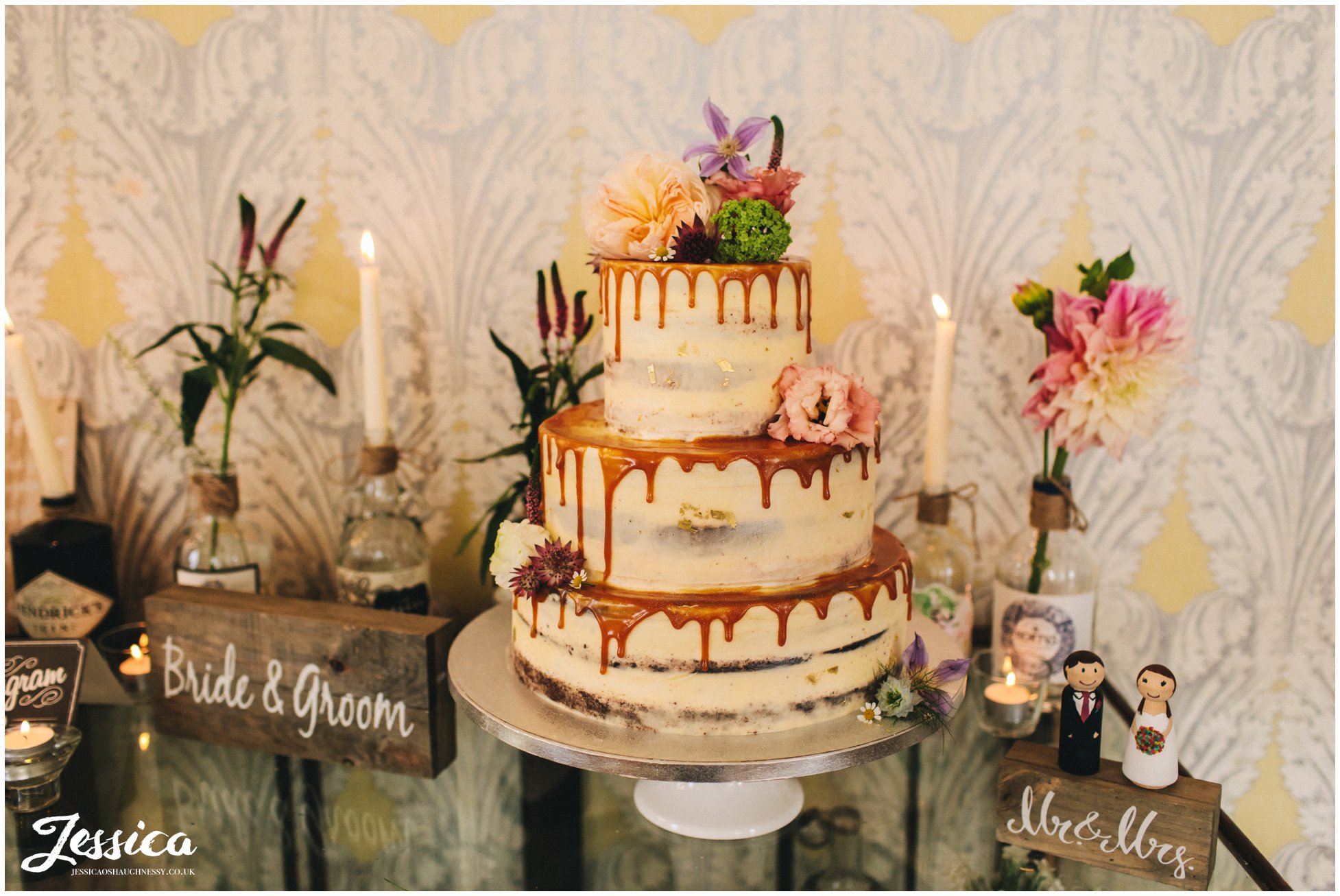 floral wedding cake with caramel drips