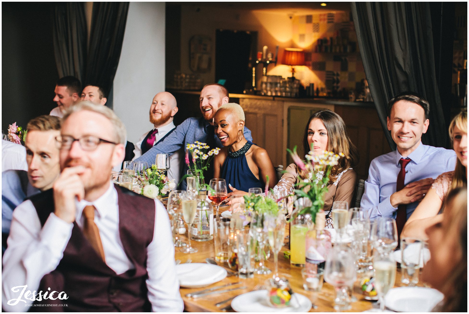 guests laughing during the speehes - oh me oh my liverpool