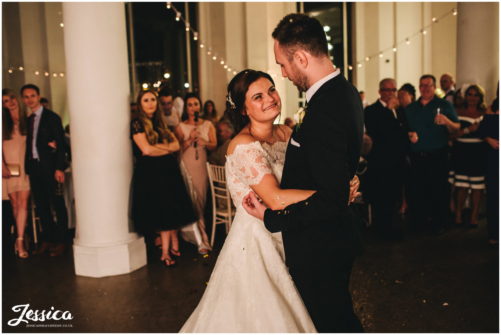 husband and wife share their first dance