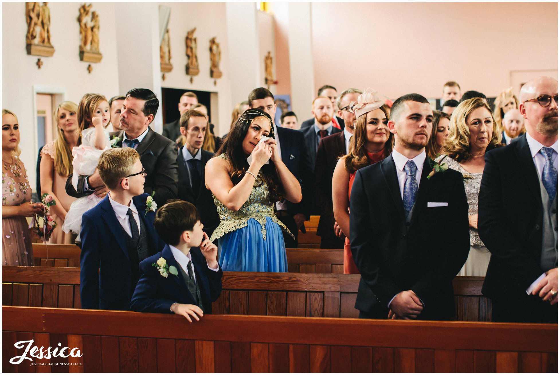 guest cry during the ceremony at Holy rosary church