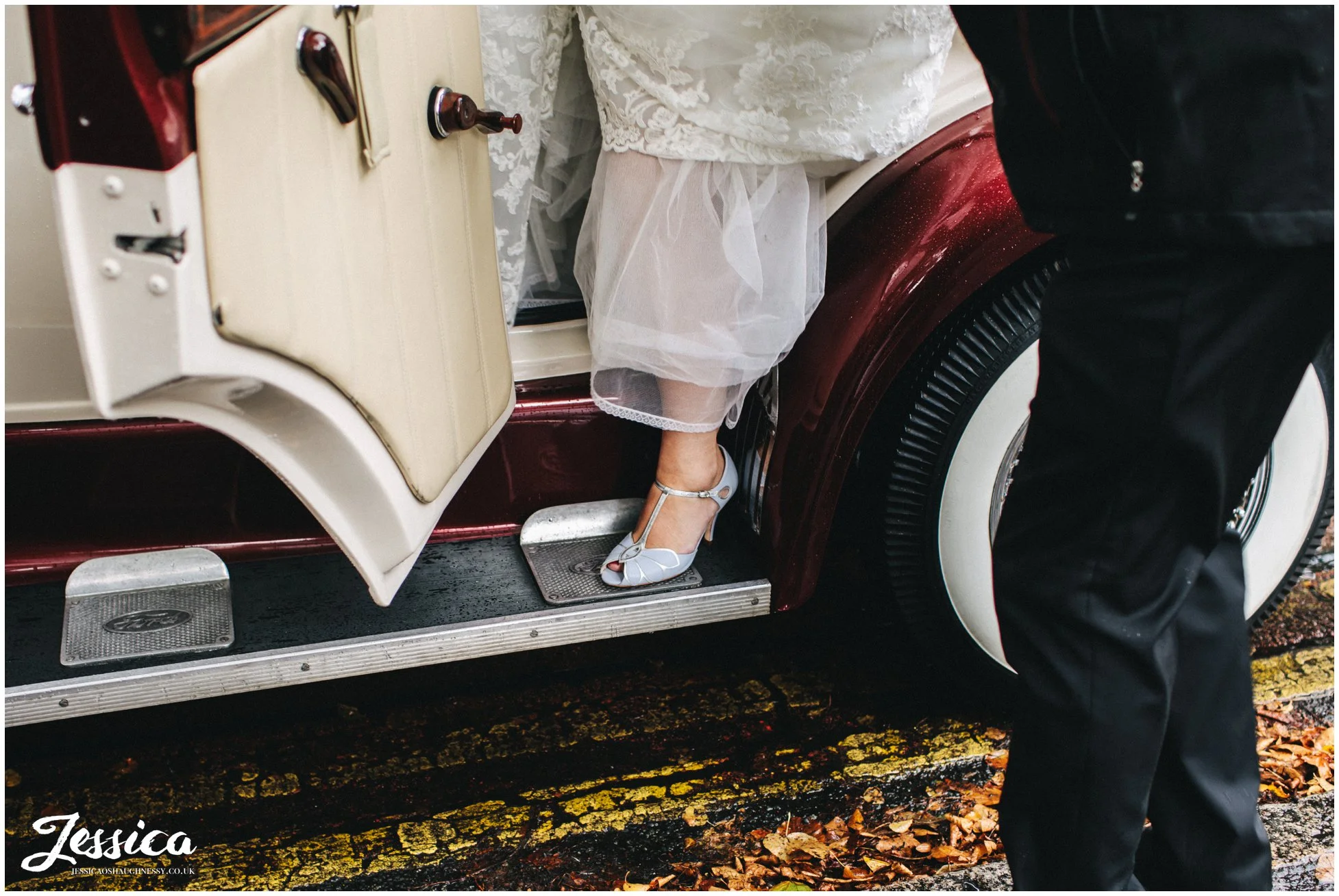 bride gets out of the wedding car at Wavertree Holy Trinity Church