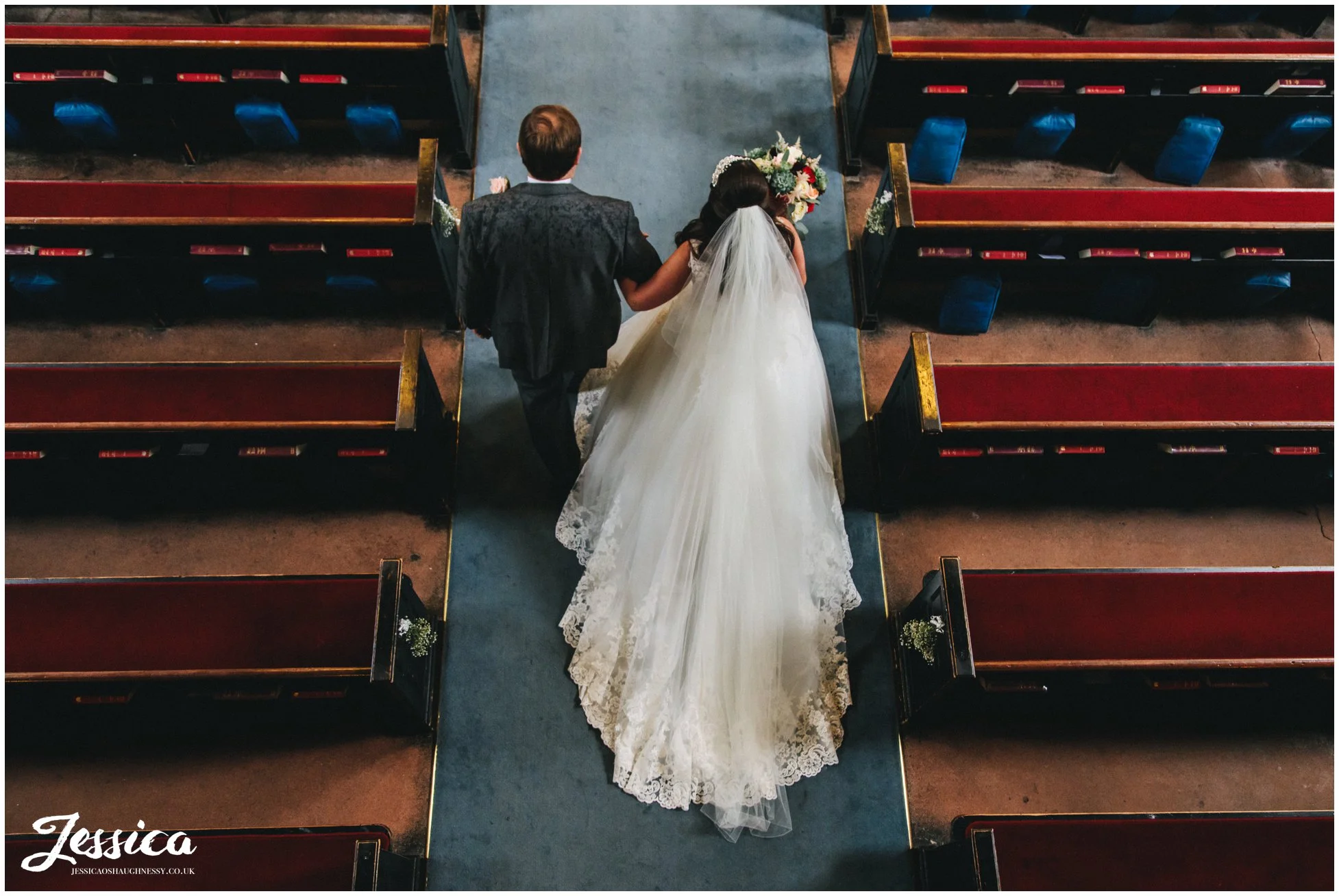 bride and father walk down the aisle