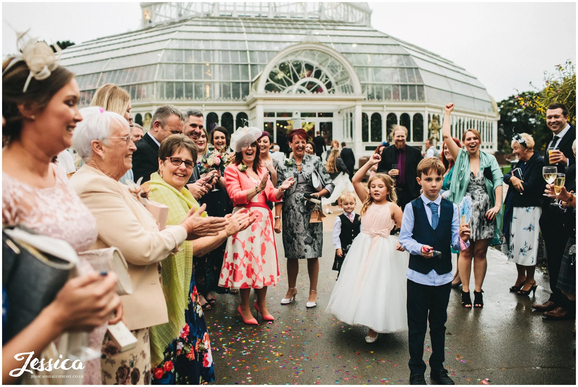 guests laugh after throwing confetti