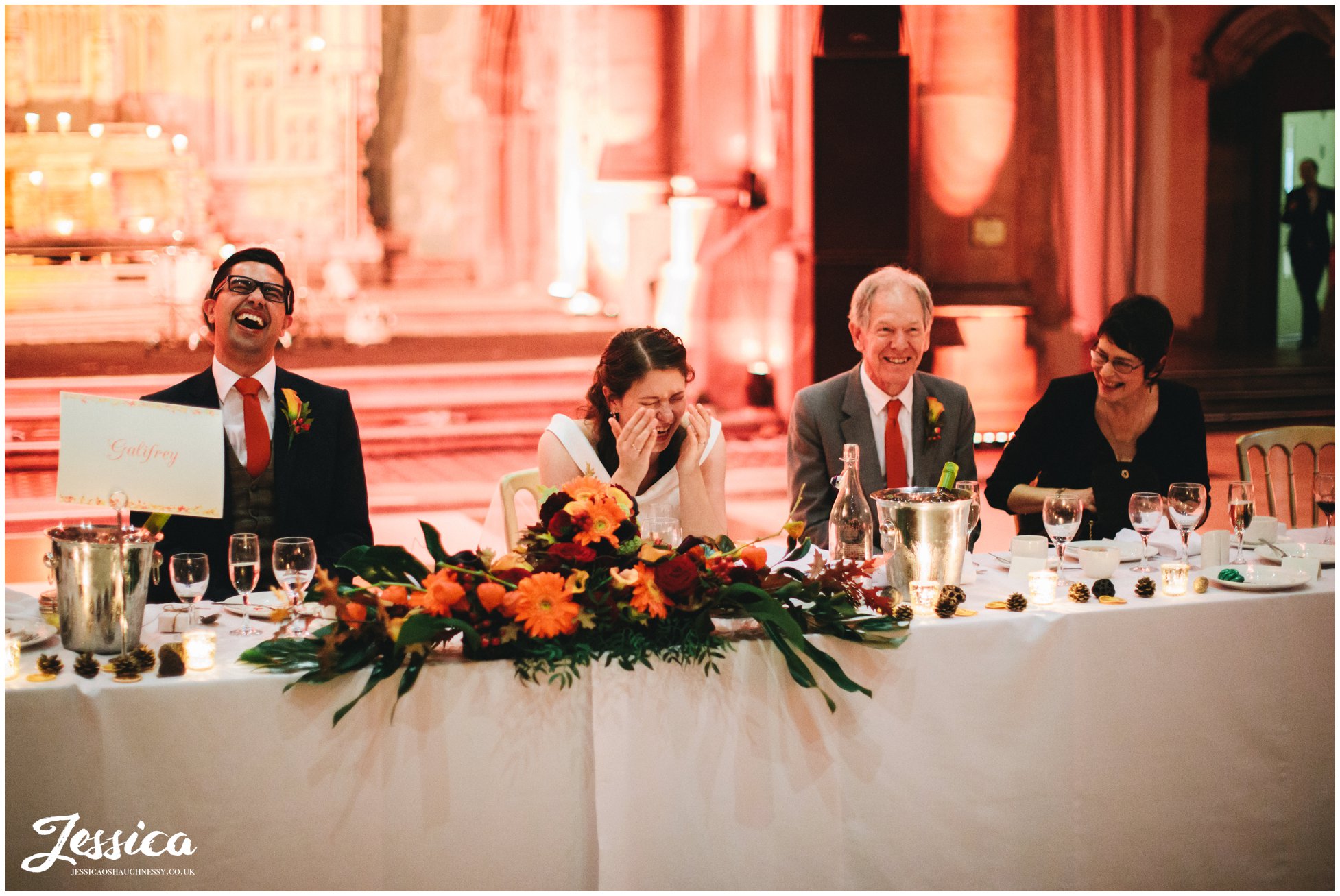 top table laughing during best man's speech