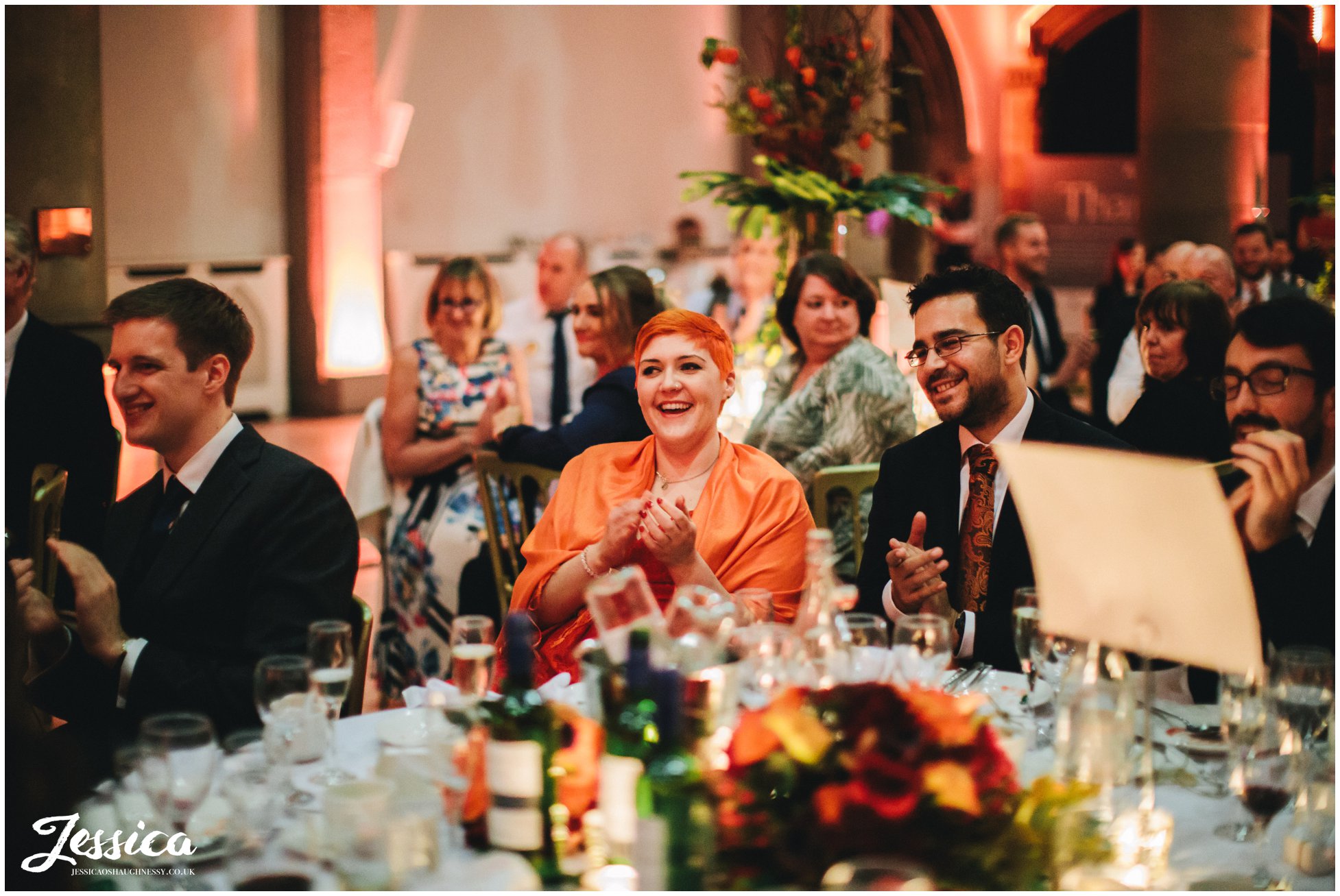 bridesmaid laughs during the best mans speech