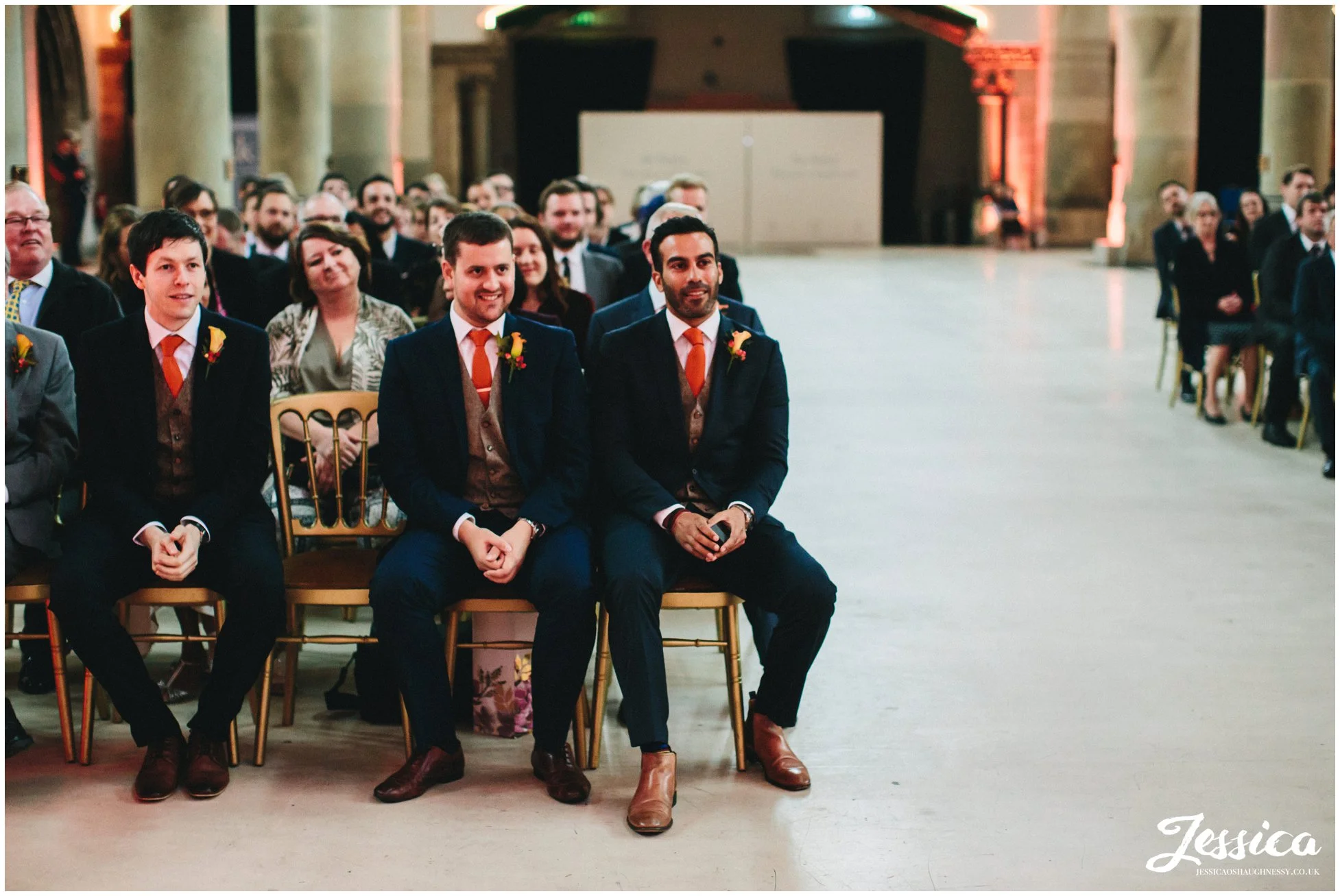 best man waits with rings during the ceremony at gorton monastery in manchester