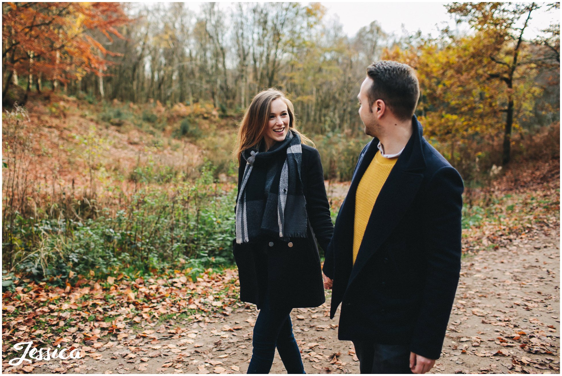 girl smiles at her fiance - a cheshire engagement shoot