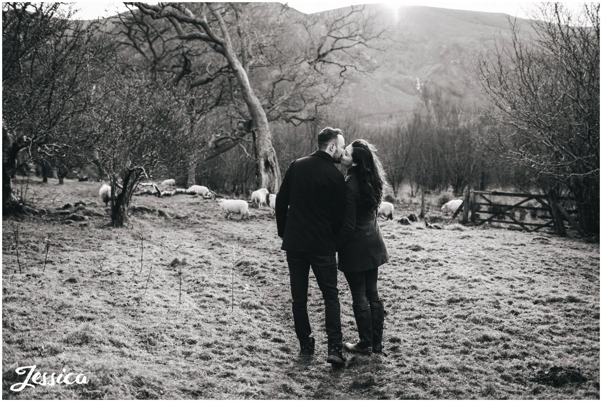 black & white photo of couple kissing - aber falls, north wales