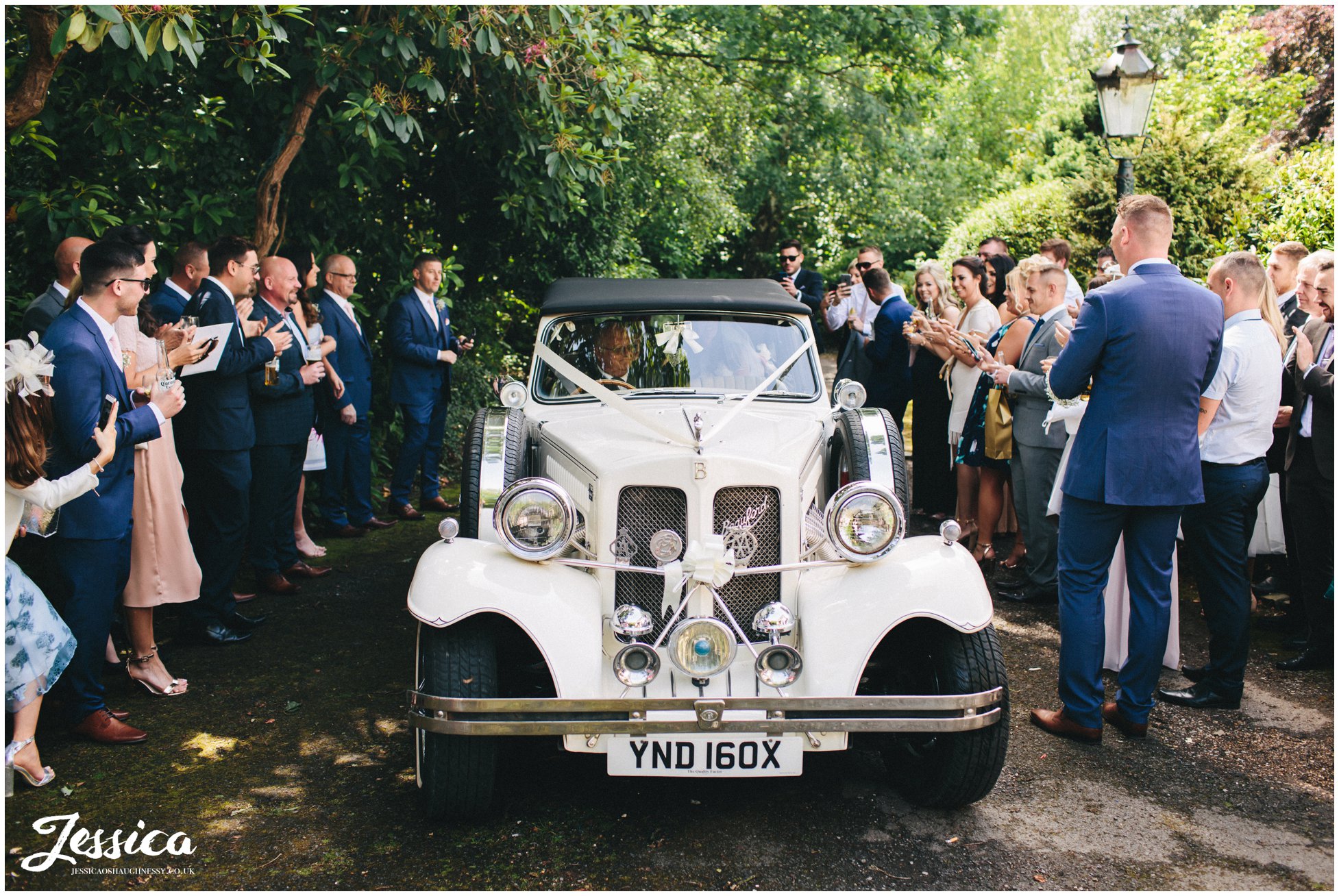 wedding car arrives at brook hall hotel