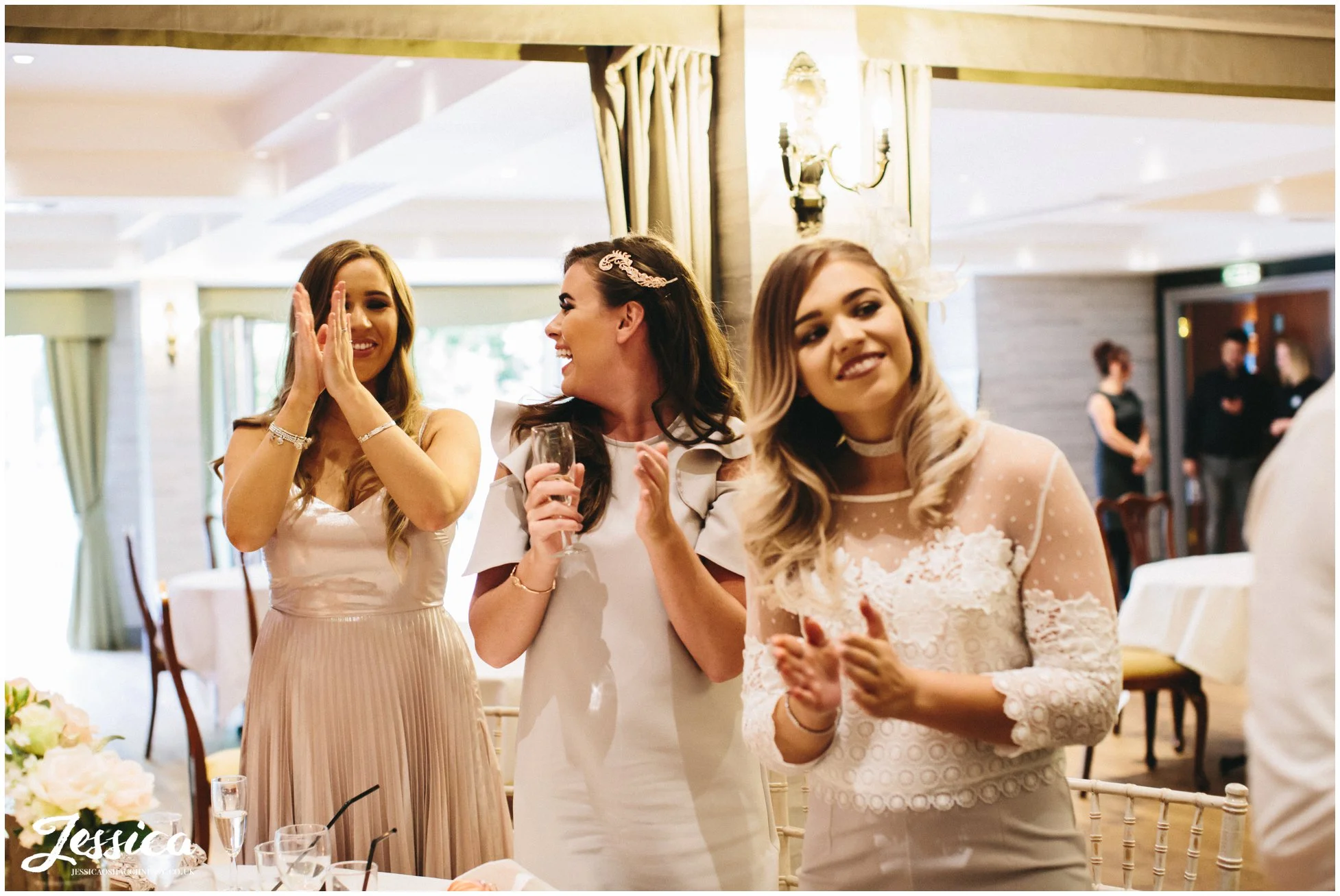 guests applaud the best men after they finish their speech