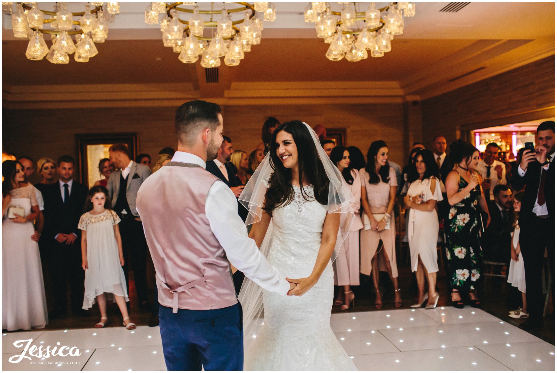 bride & groom share their first dance as husband & wife