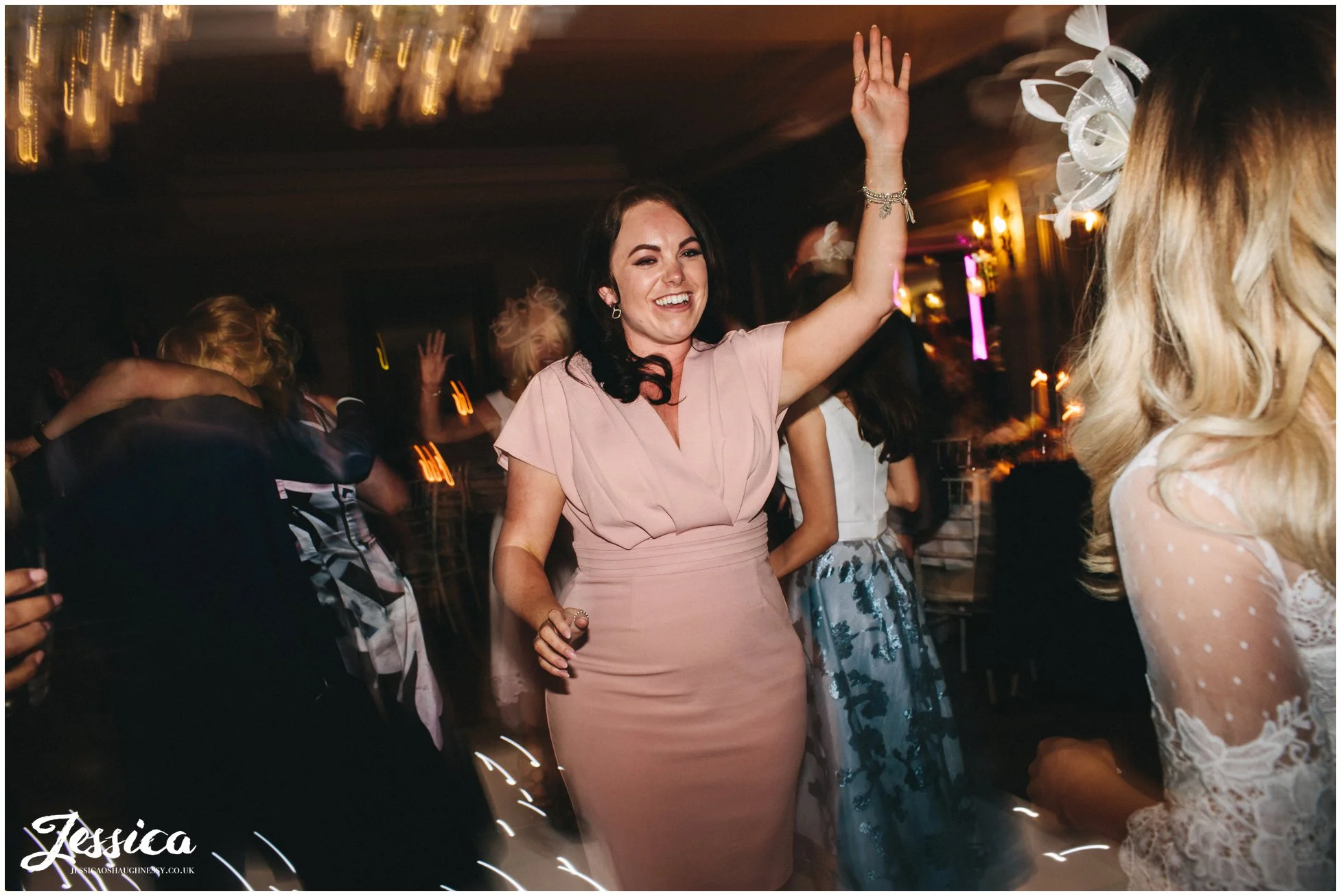 brides friends dance at brook hall hotel