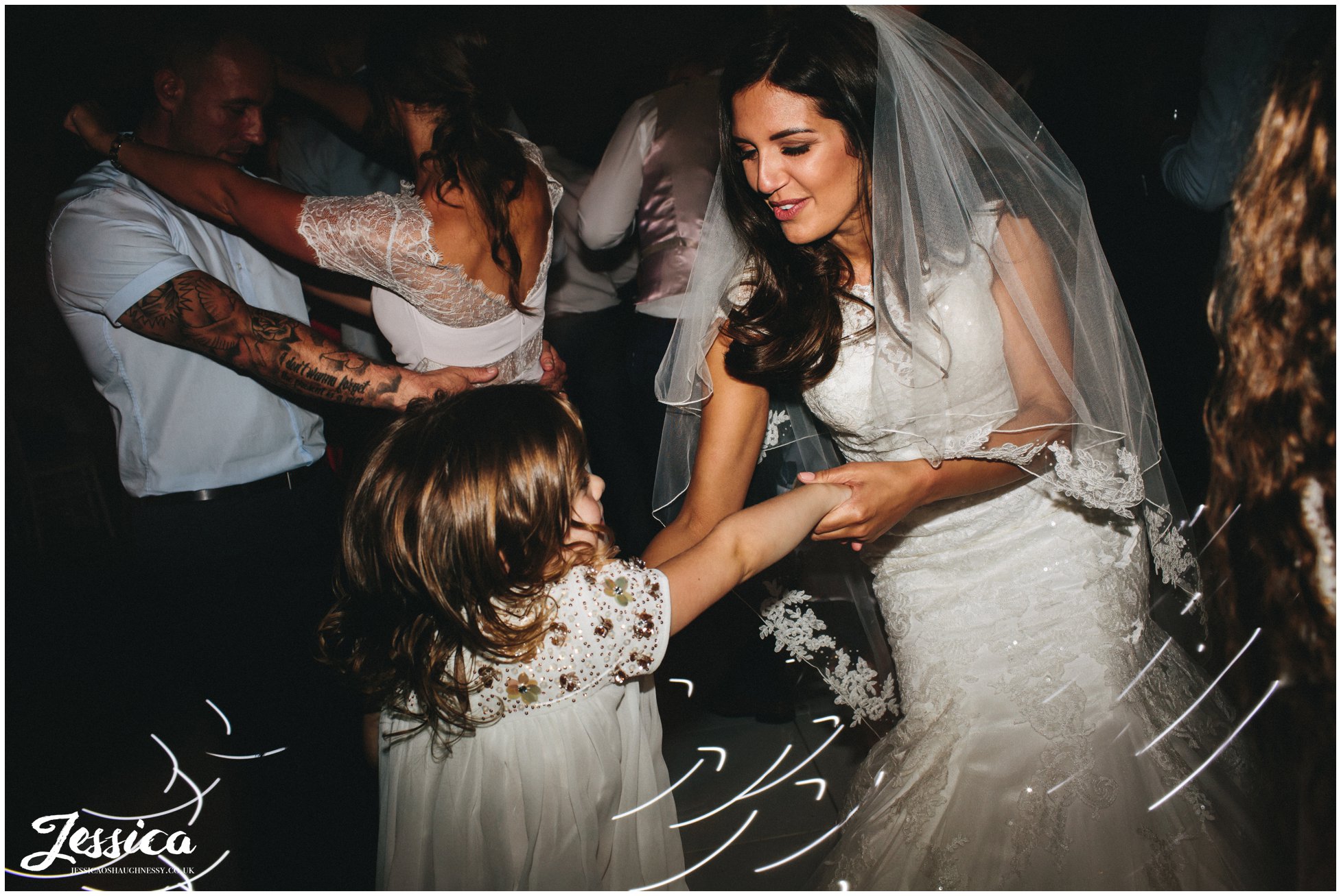 bride dances with her daughter at her wirral wedding reception 