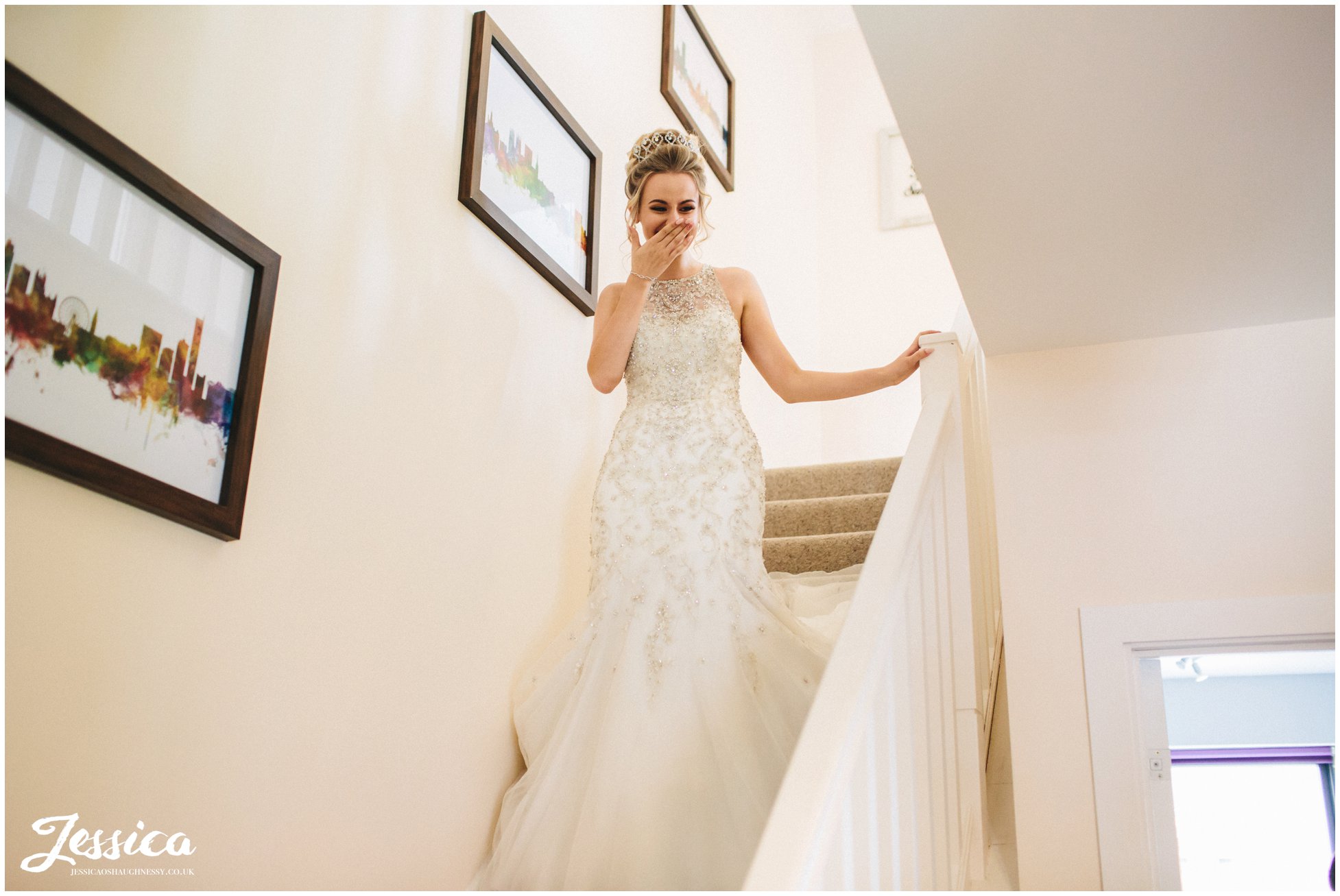 bride feels emotional walking downstairs to leave for the ceremony