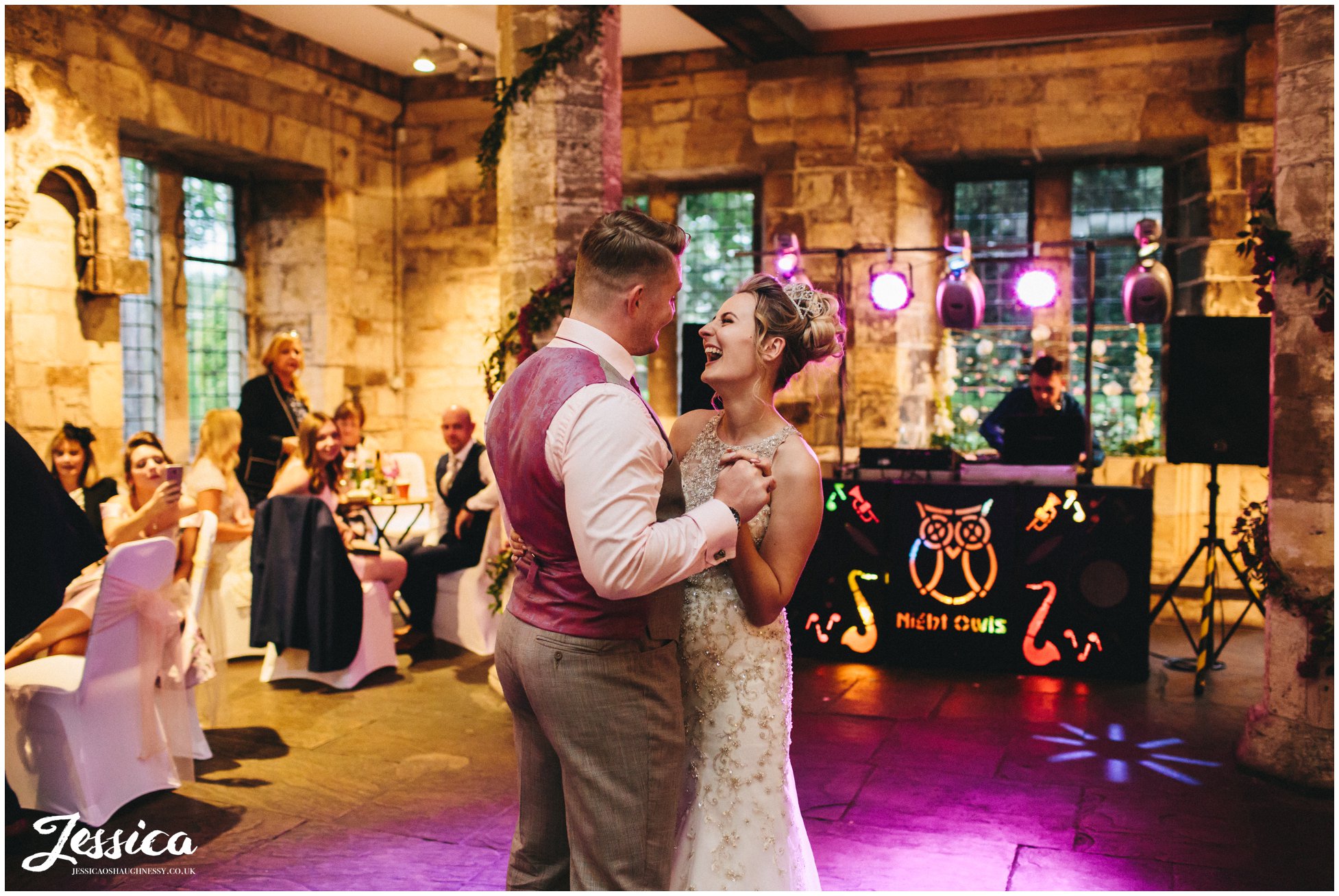 newly wed's share their first dance together at the hospitium