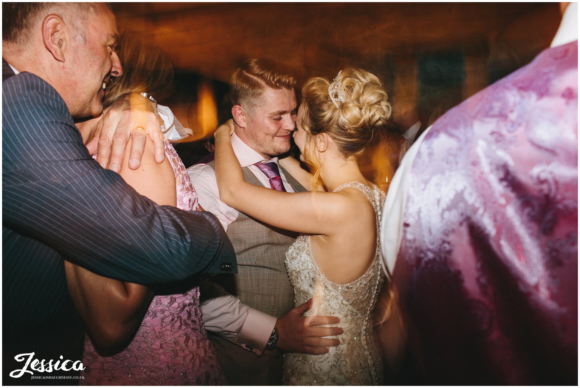 husband & wife dance together at the wedding reception in york