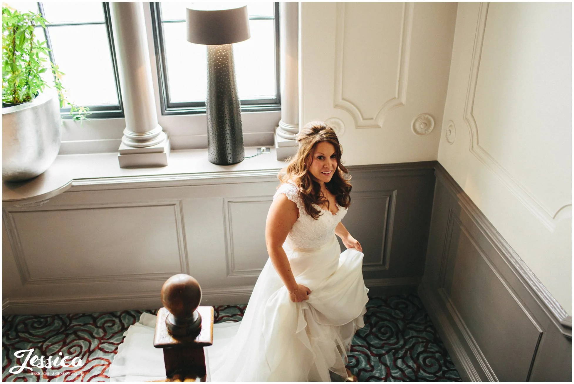 the bride walks up the stairs at oddfellows in chester