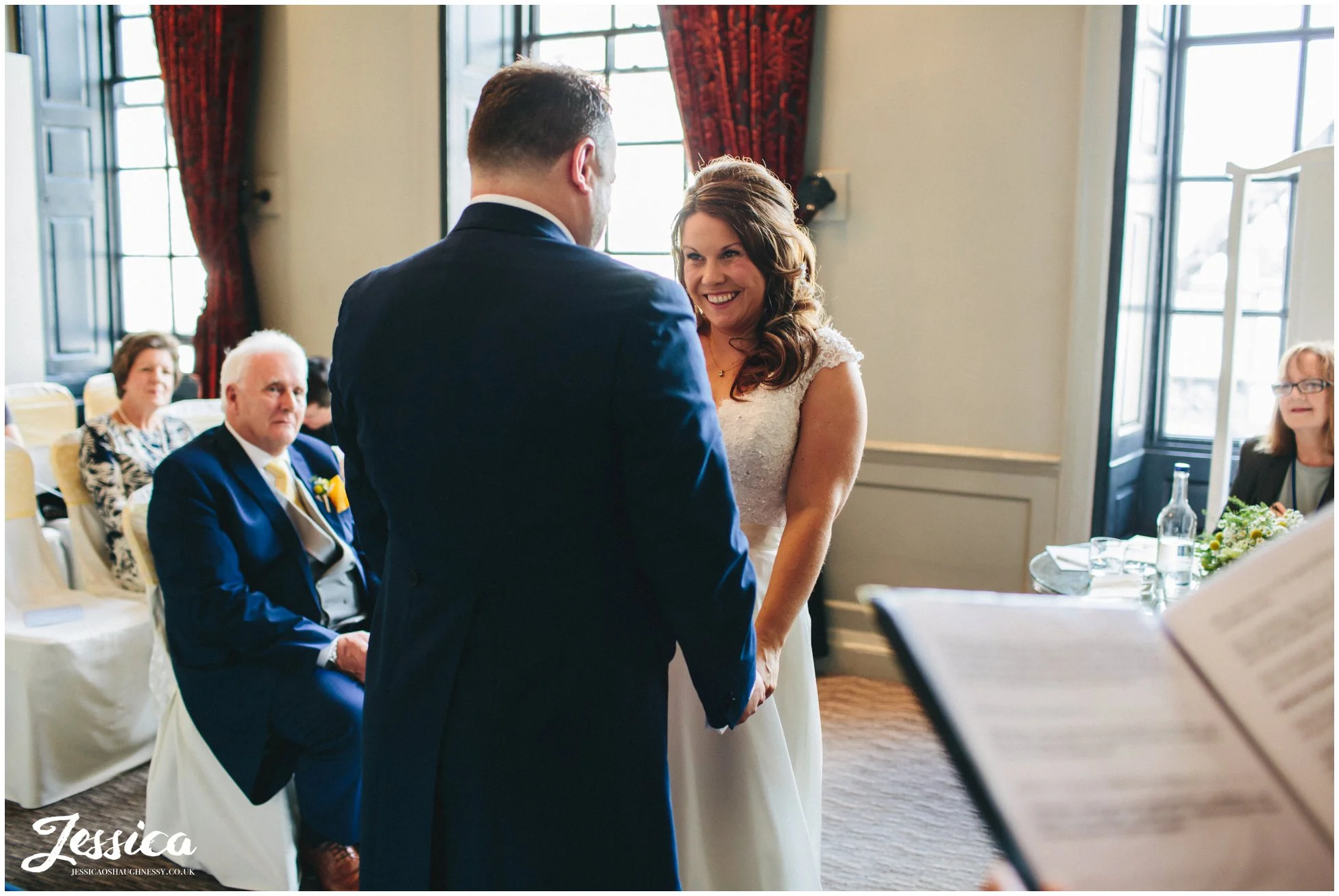 bride smiles at her groom during their chester wedding ceremony