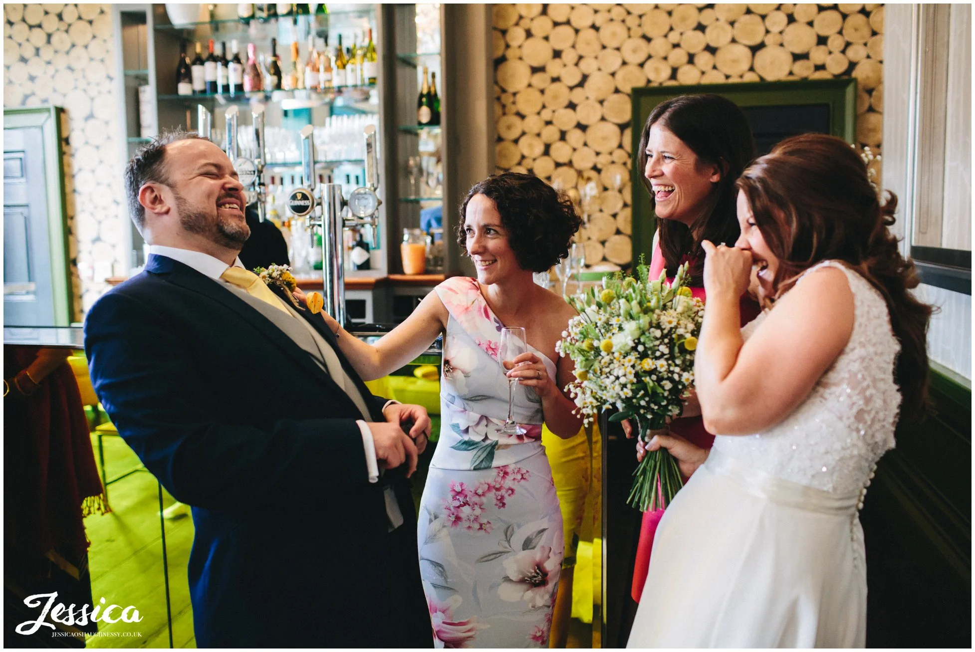 at an oddfellows wedding reception the groom celebrates with his friends