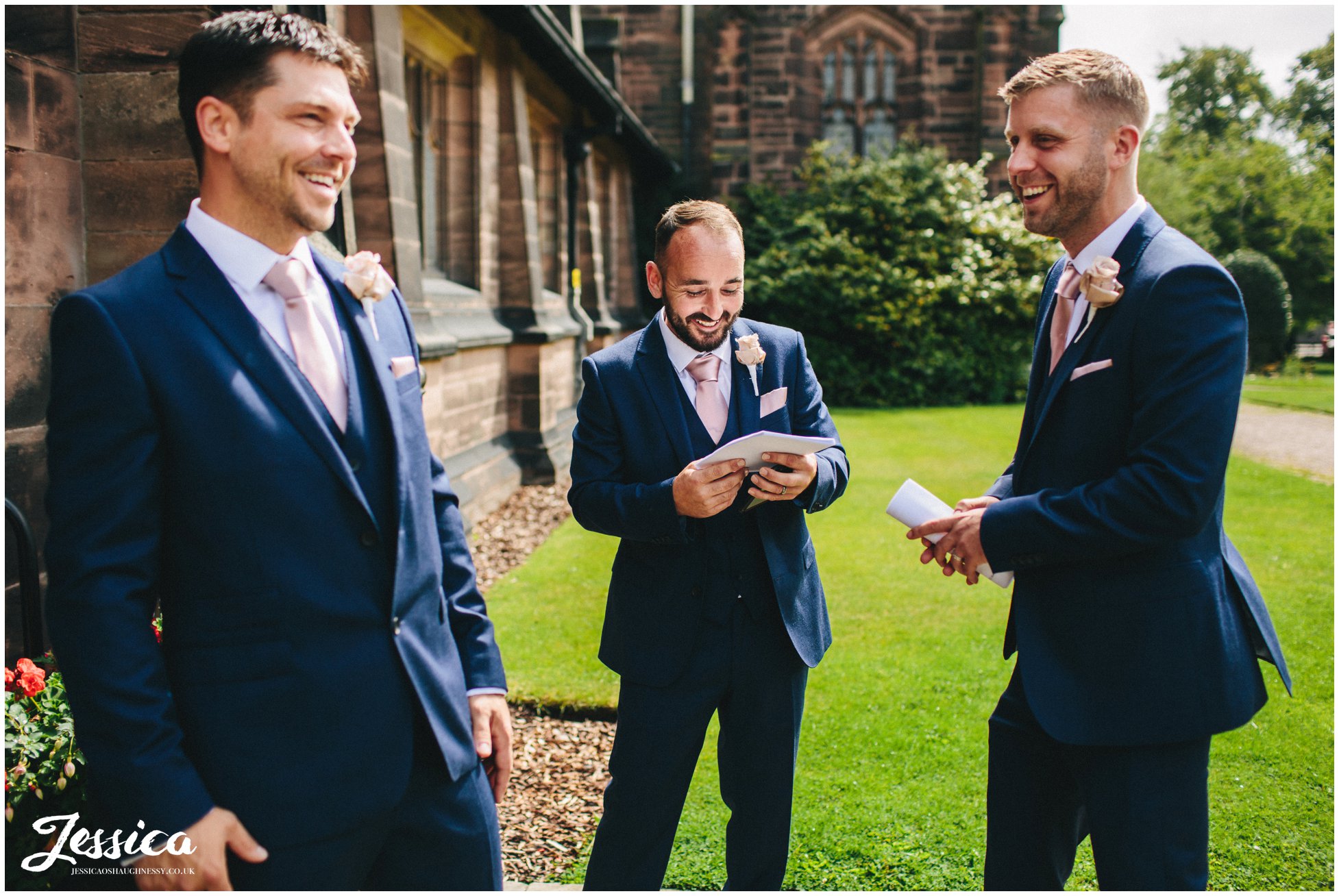 groomsmen great the guests as they arrive at the wirral church