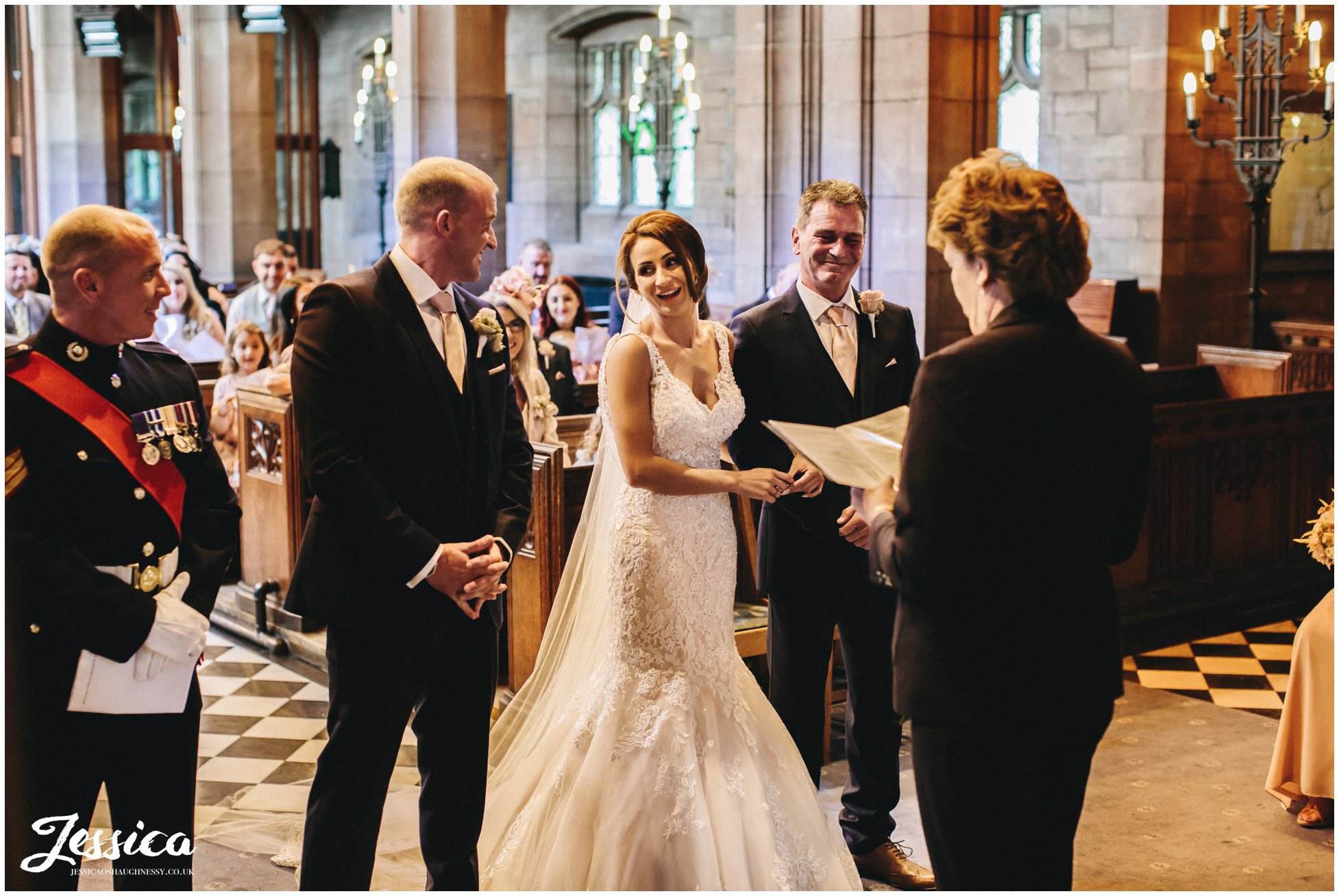 bride laughs during the wirral wedding ceremony