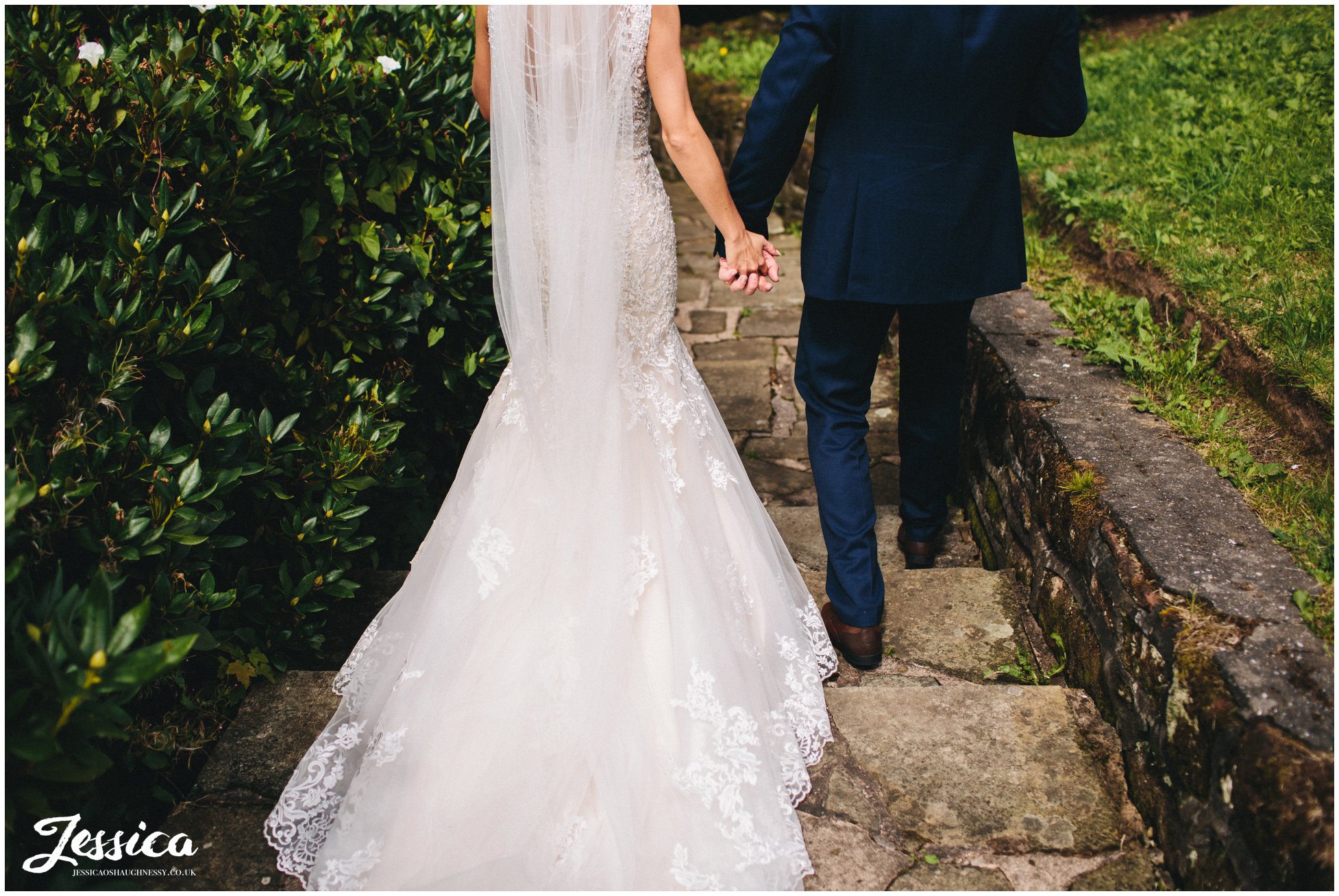 newly wed's walk down steps at the dell in port sunlight