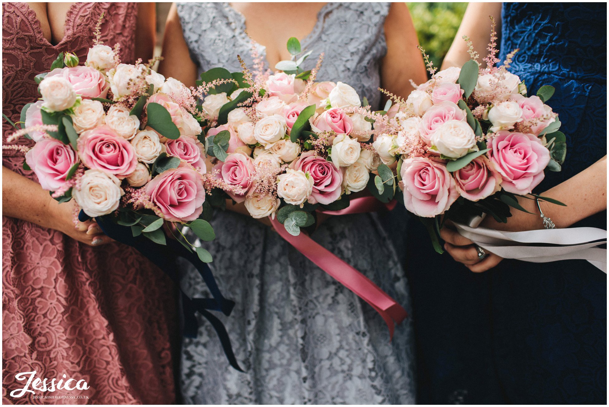 detail shot of bridesmaids holding their bouquets