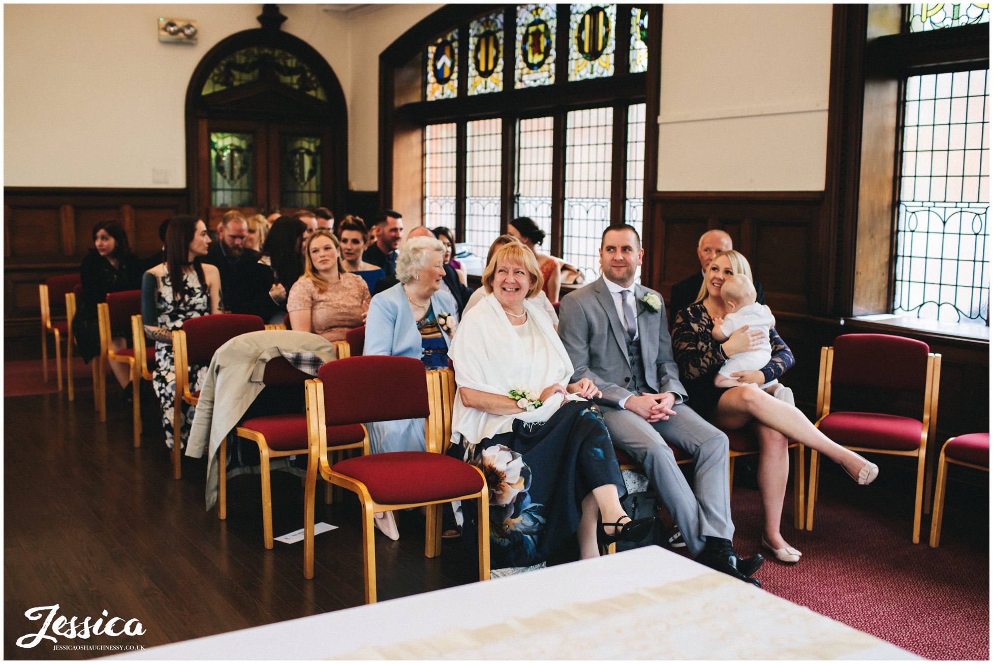 guests laughing in altrincham town hall