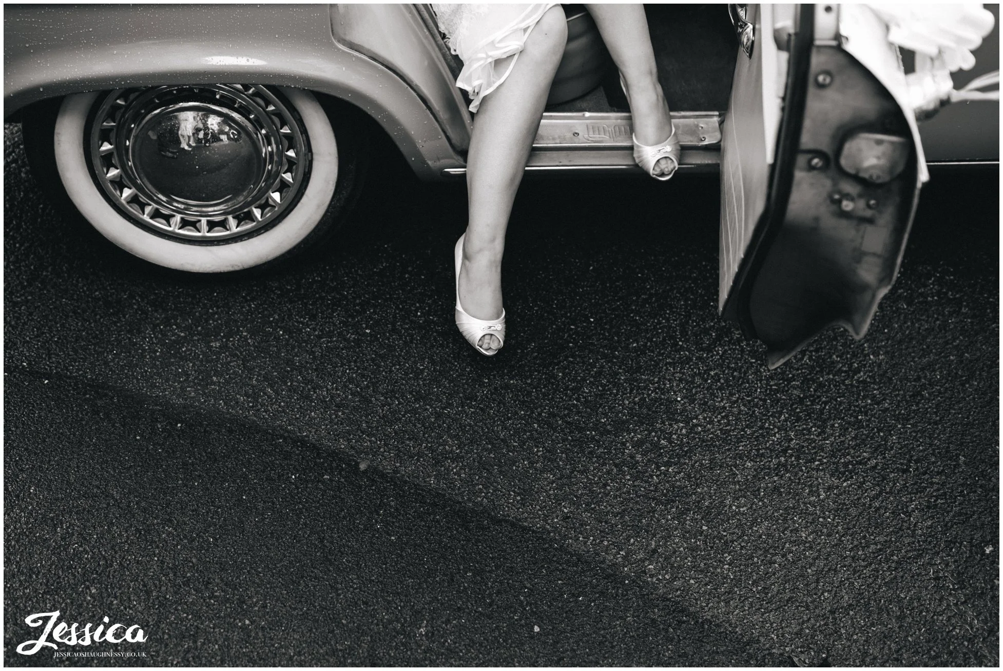 bride gets out of the wedding car for their manchester wedding reception