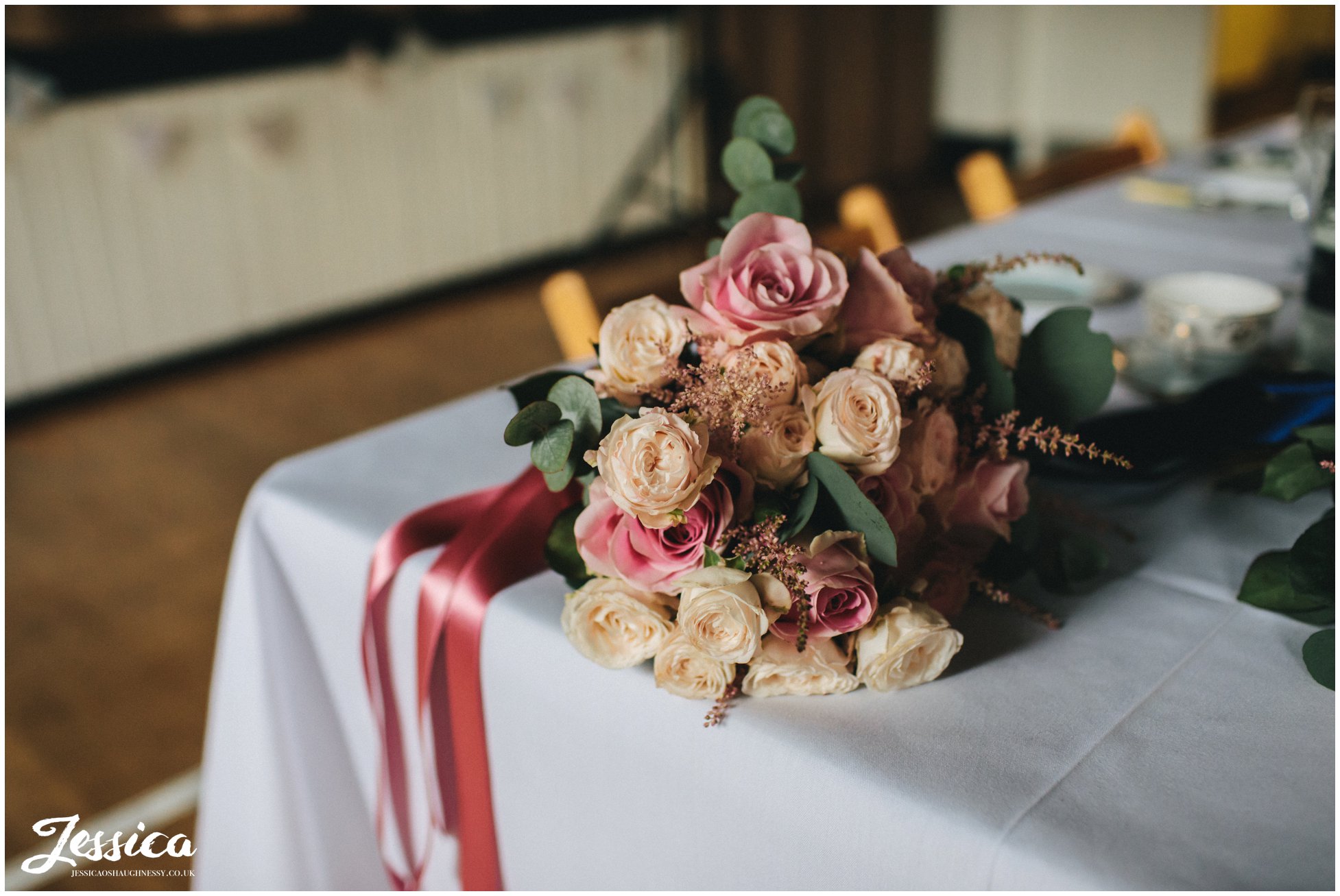 bouquet sits on wedding tables at a manchester wedding