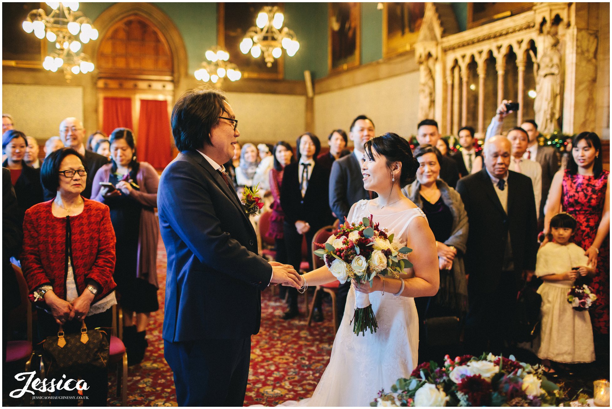 bride & groom greet each other for the first time on their wedding day in manchester