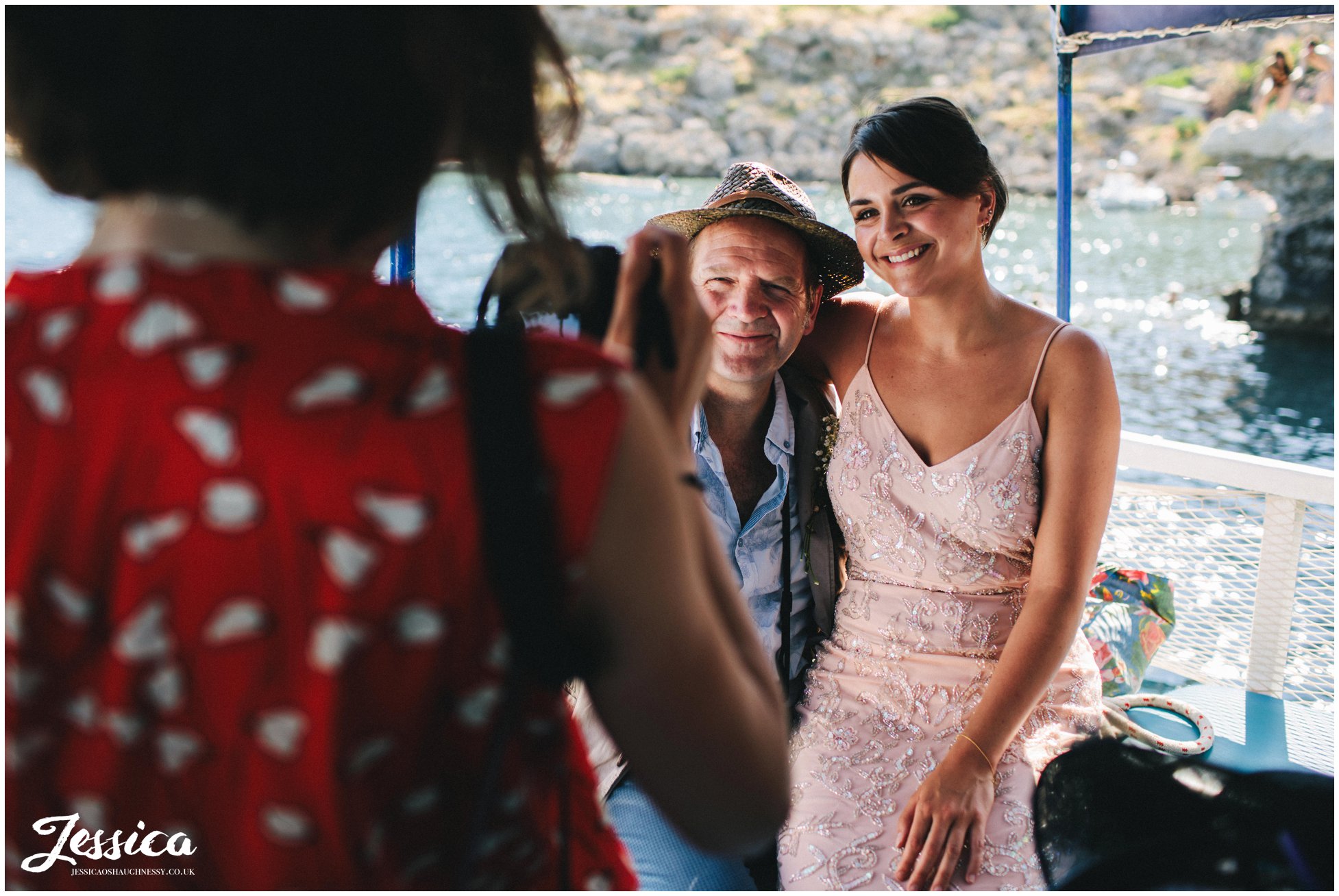 bridesmaid poses for a photo with her uncle