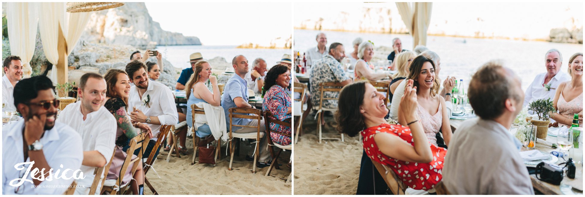 wedding guests listen to the speeches with sand under their feet
