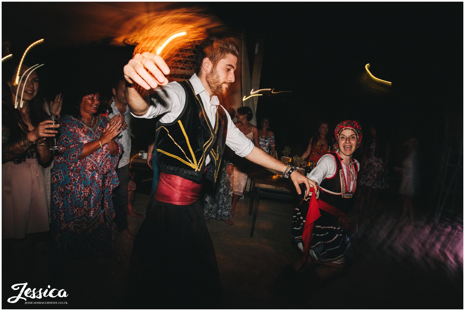 greek dancers arrive to start the party