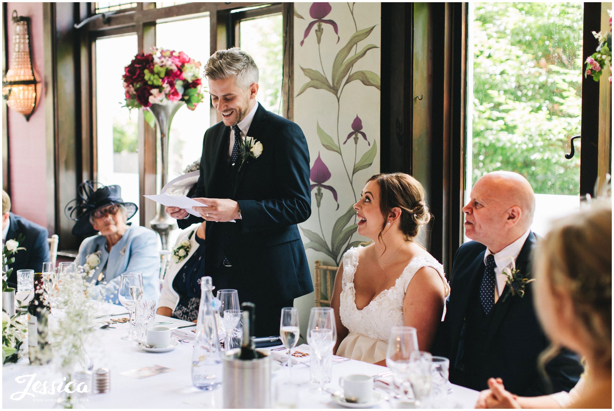 the groom stands to give his speech at belle epoque wedding venue