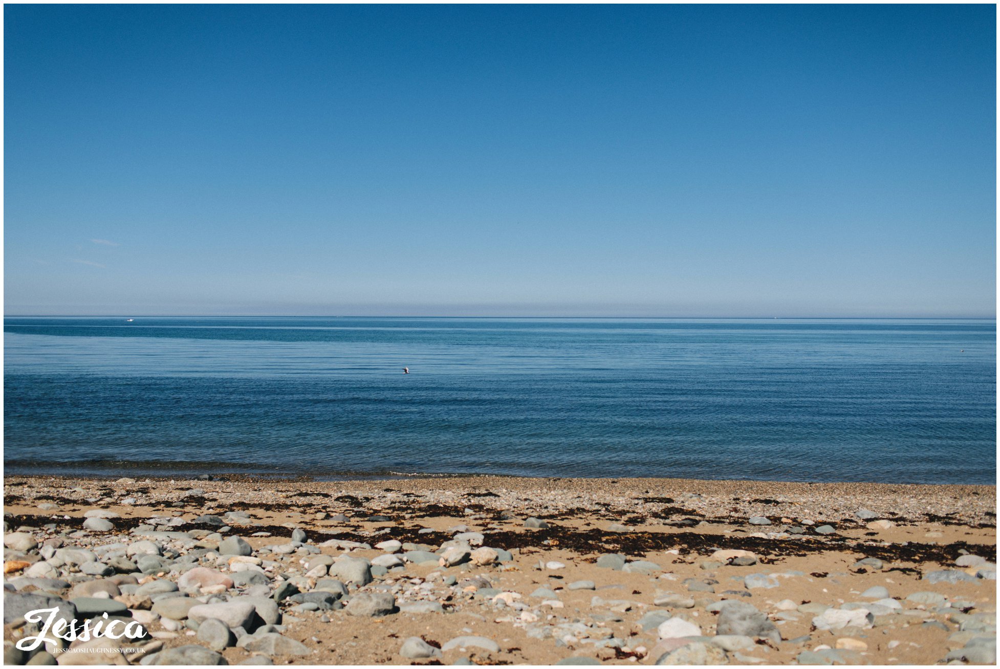 Caernarfon bay with perfect blue skies