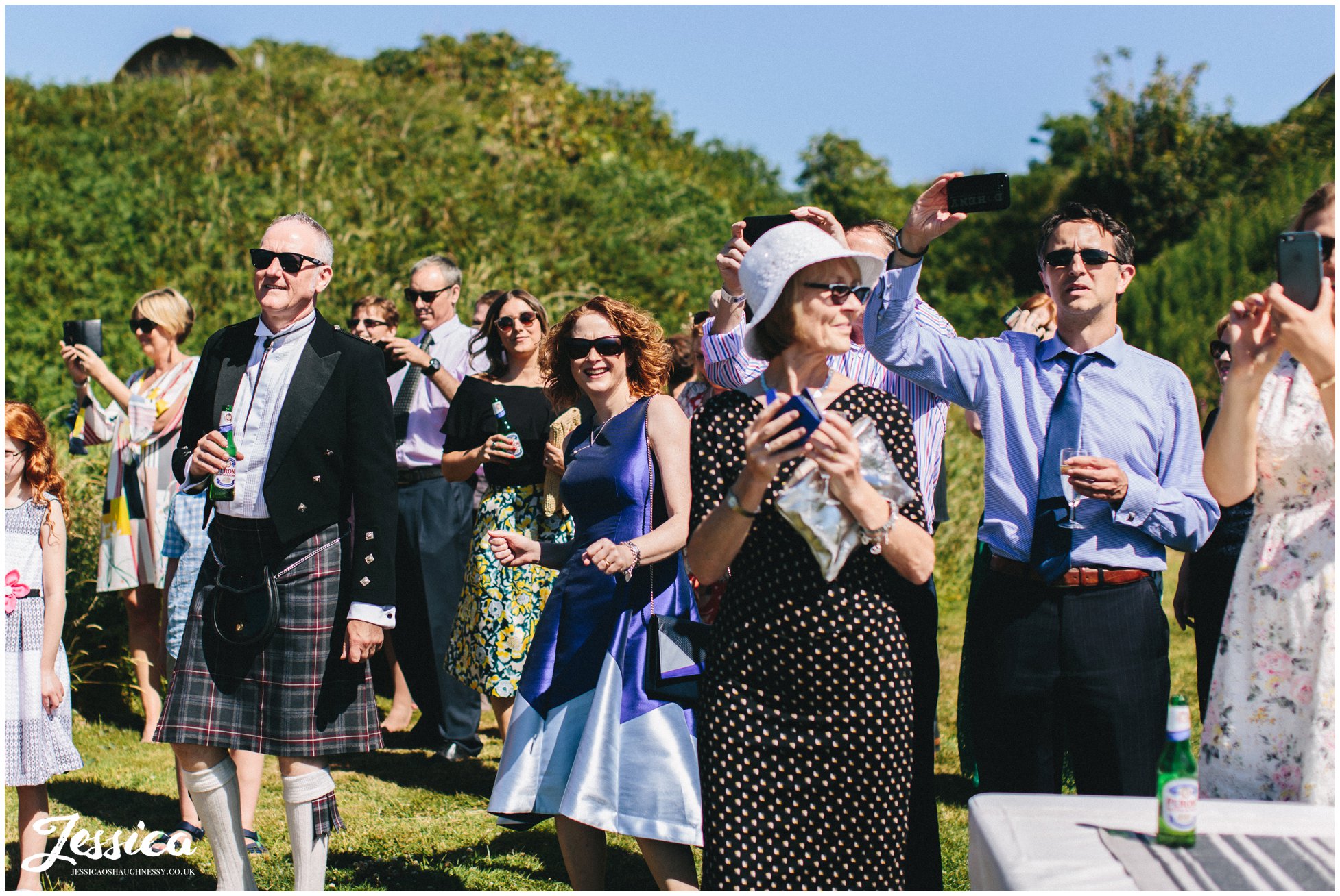 guests dance to the brass band playing