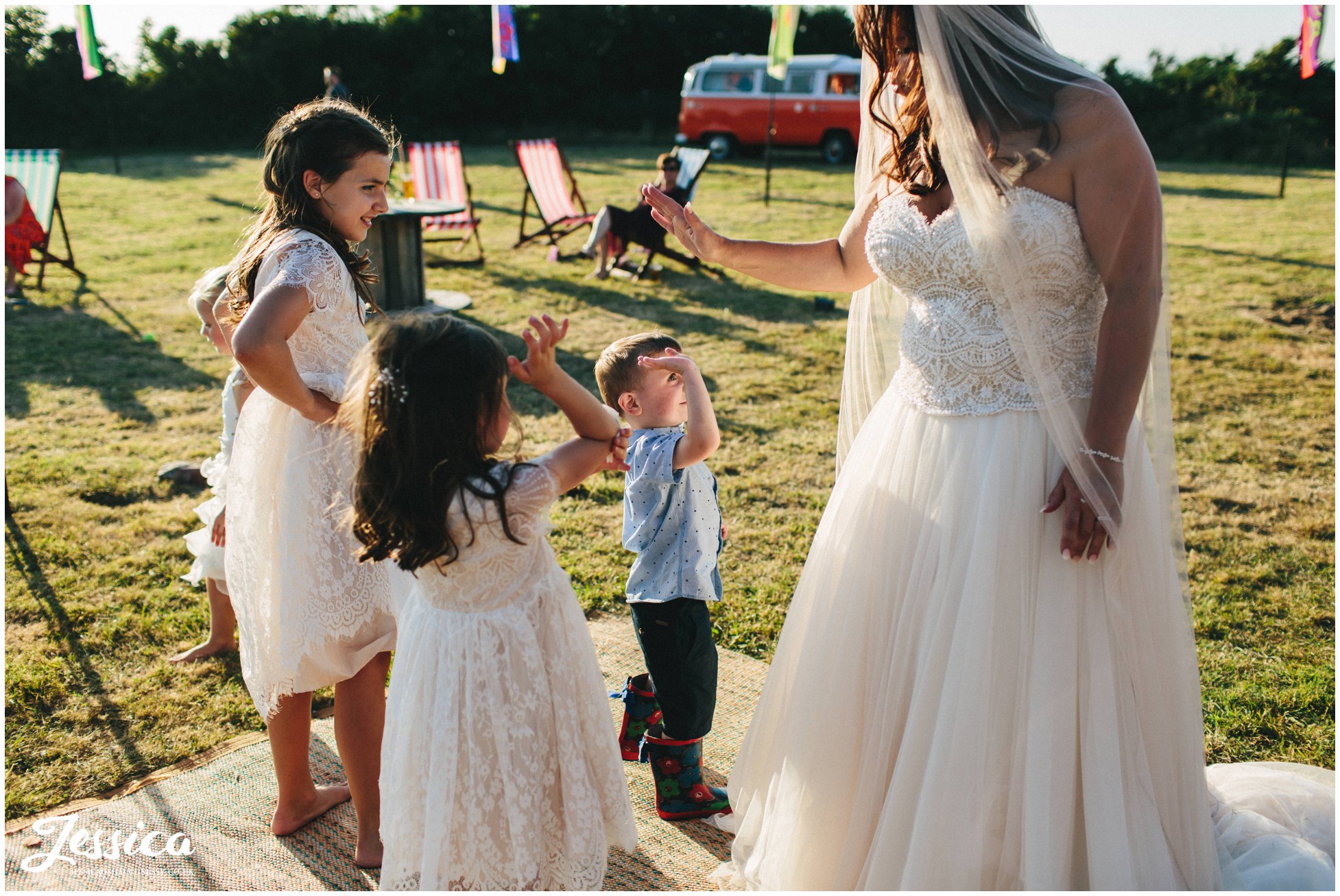 children high 5 the bride at her Caernarfon wedding